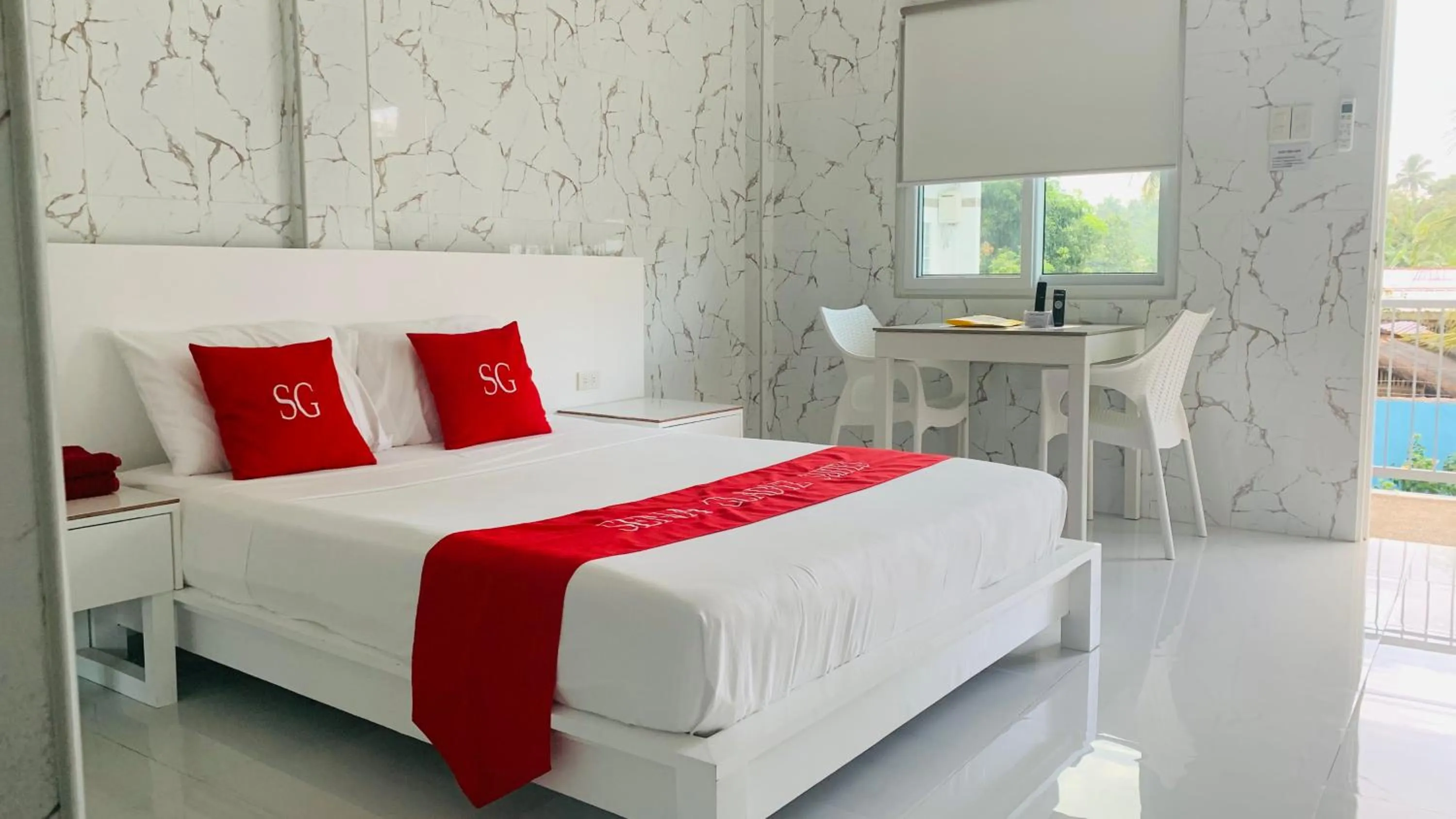 Bed in Sena Gladyz Suites