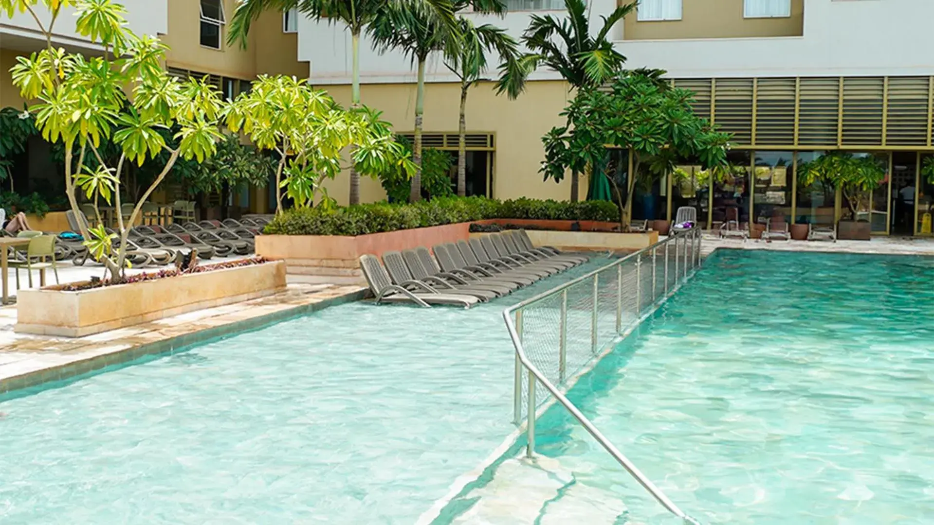 Pool view in Hot Beach Suites Pool view in Hot Beach Suites