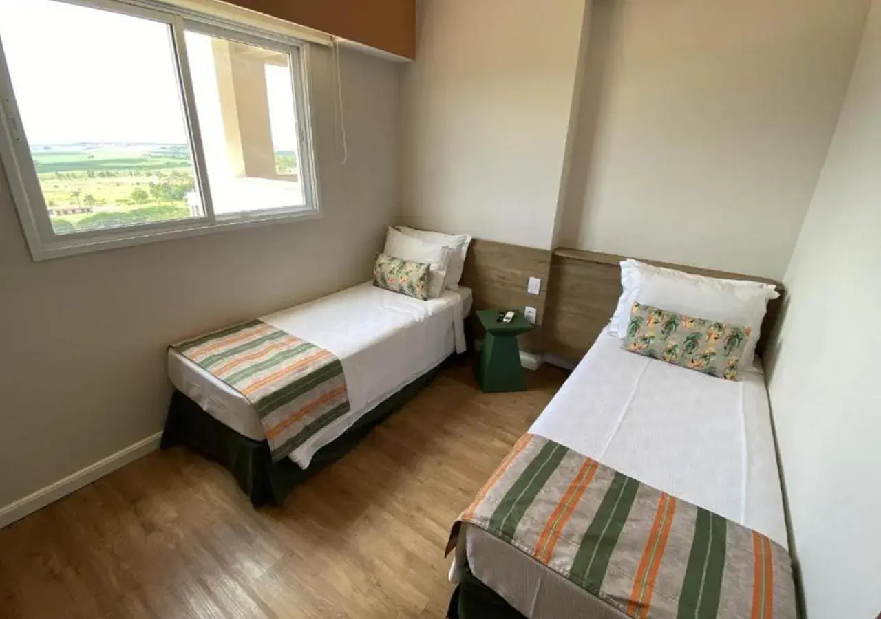 Bed in Hot Beach Suites Bed in Hot Beach Suites