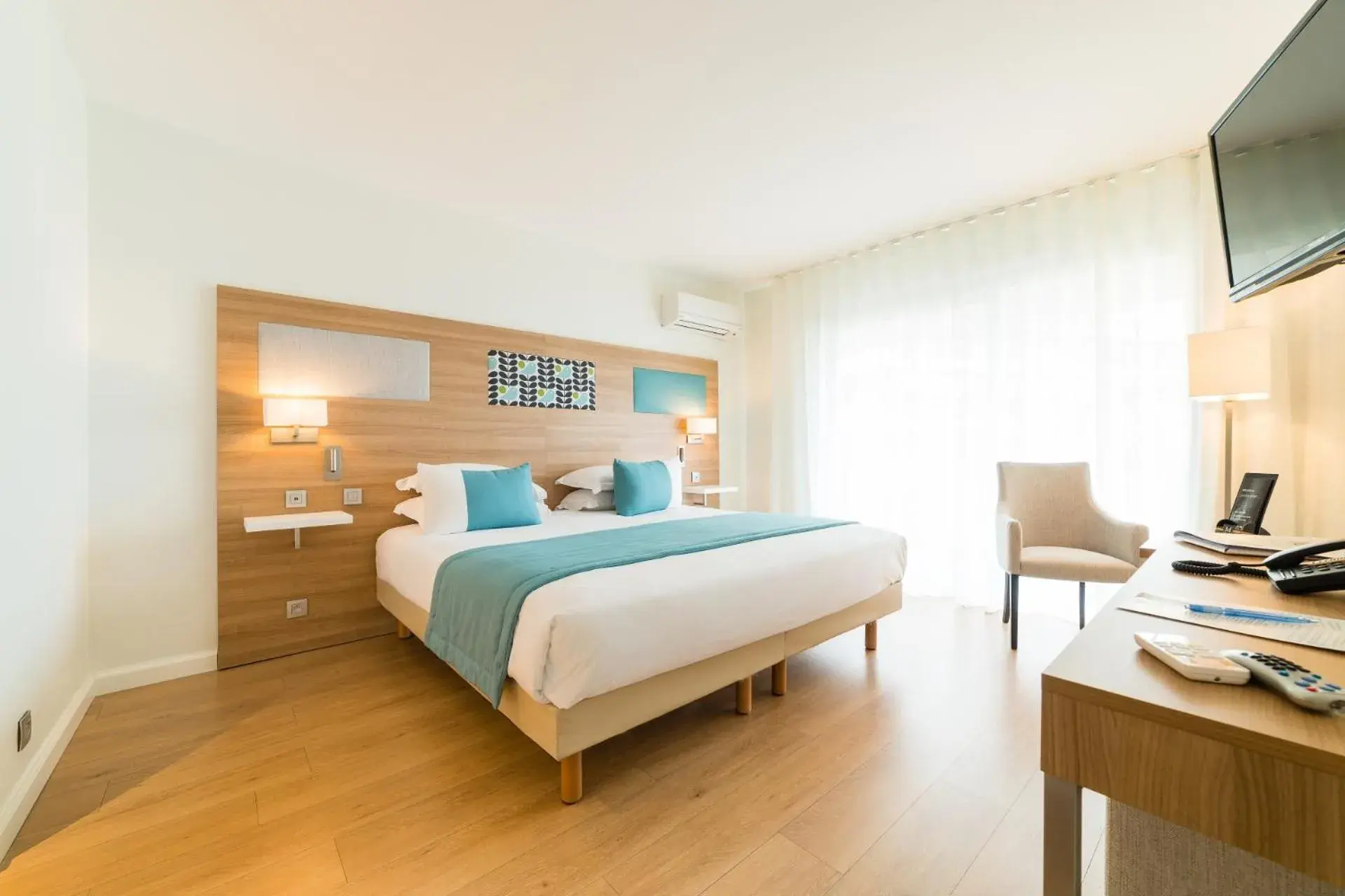 Photo of the whole room, Bed in Hôtel Hélios Photo of the whole room, Bed in Hôtel Hélios