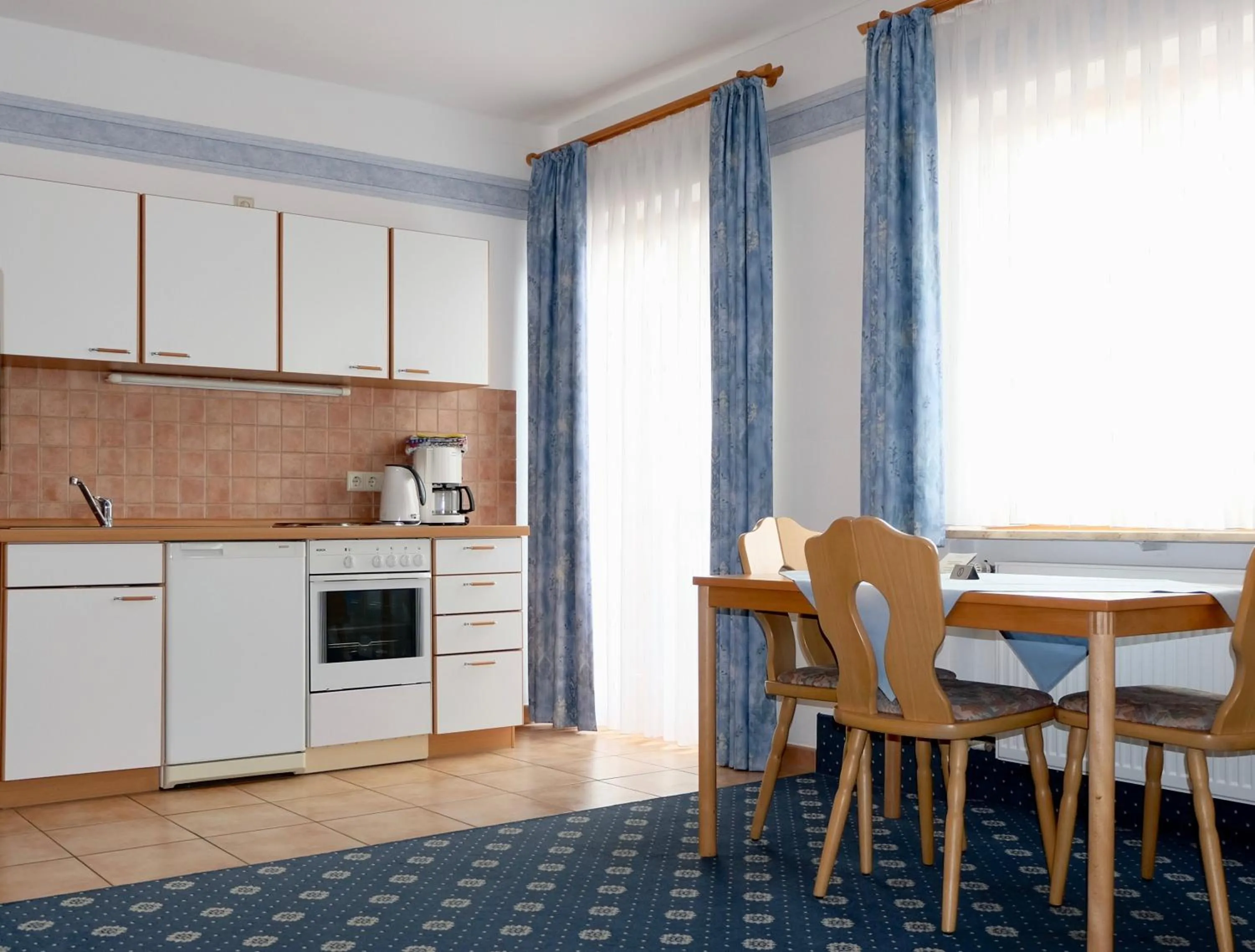 Kitchen or kitchenette in Gästehaus Biedermann