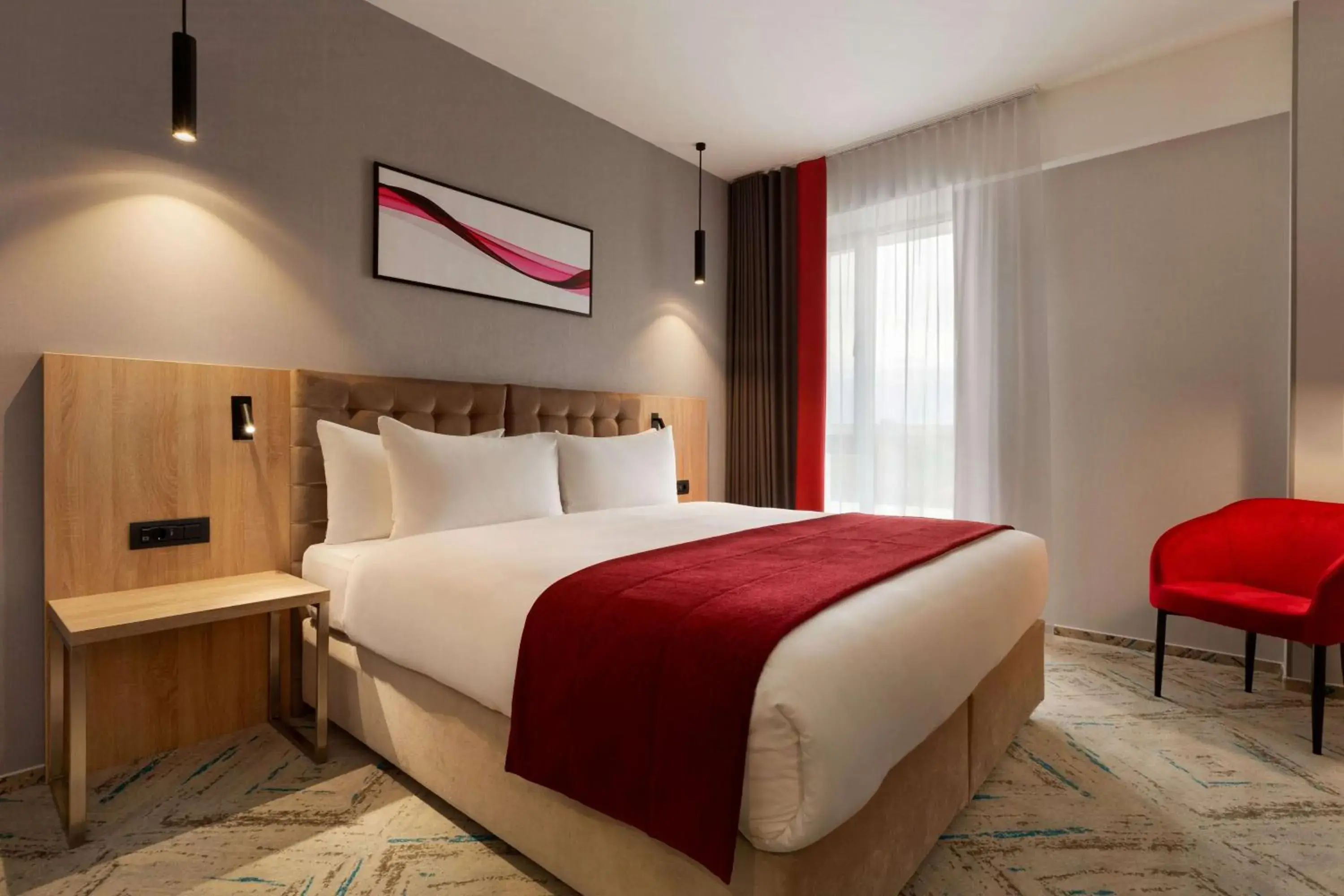 Photo of the whole room, Bed in Ramada by Wyndham Targu Jiu Photo of the whole room, Bed in Ramada by Wyndham Targu Jiu