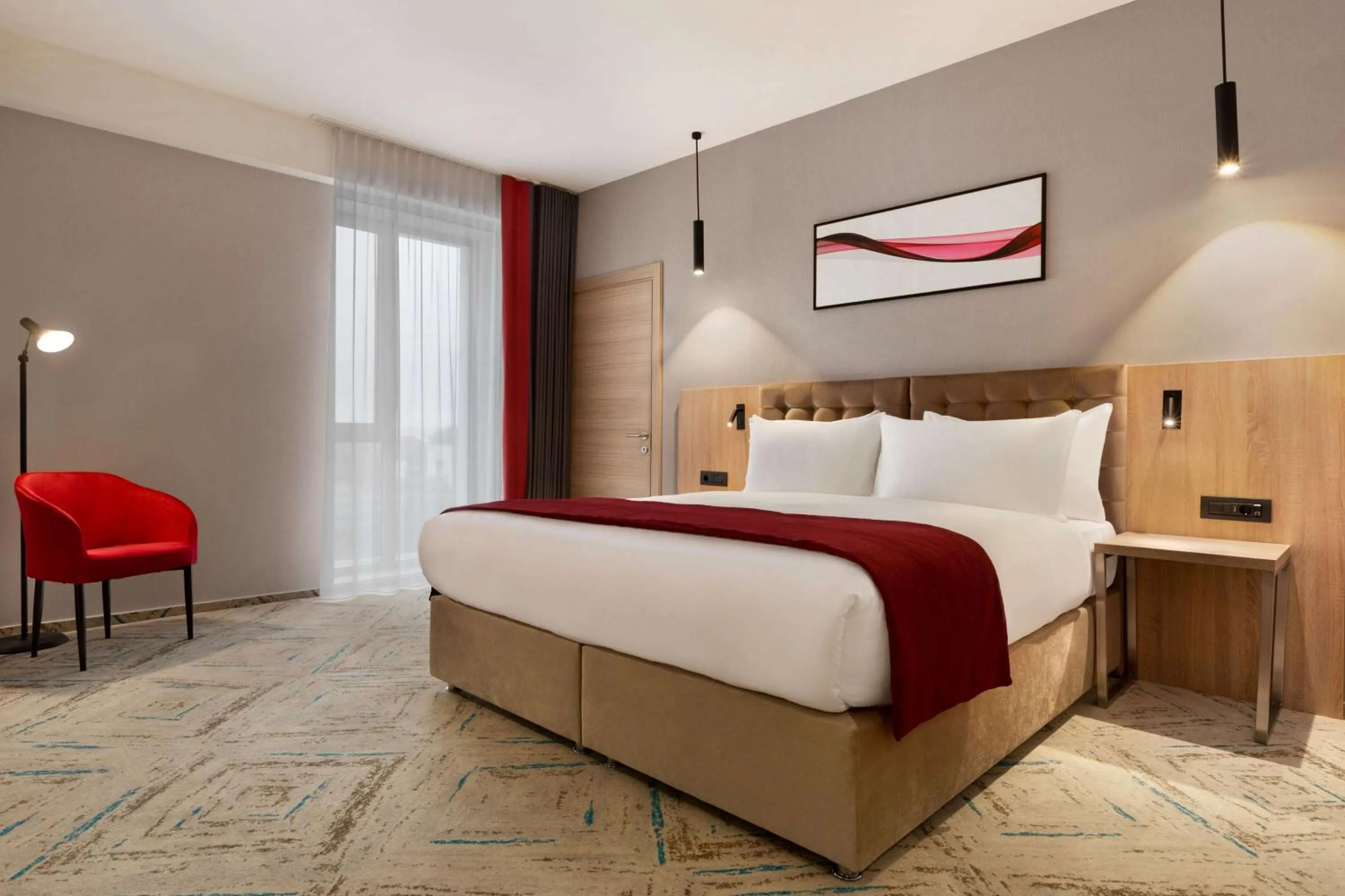 Photo of the whole room, Bed in Ramada by Wyndham Targu Jiu