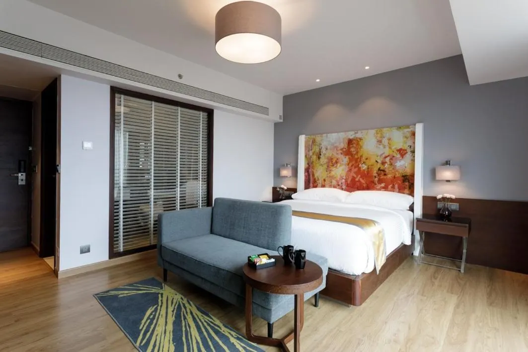 Photo of the whole room, Bed in Svenska Design Hotel Kakinada