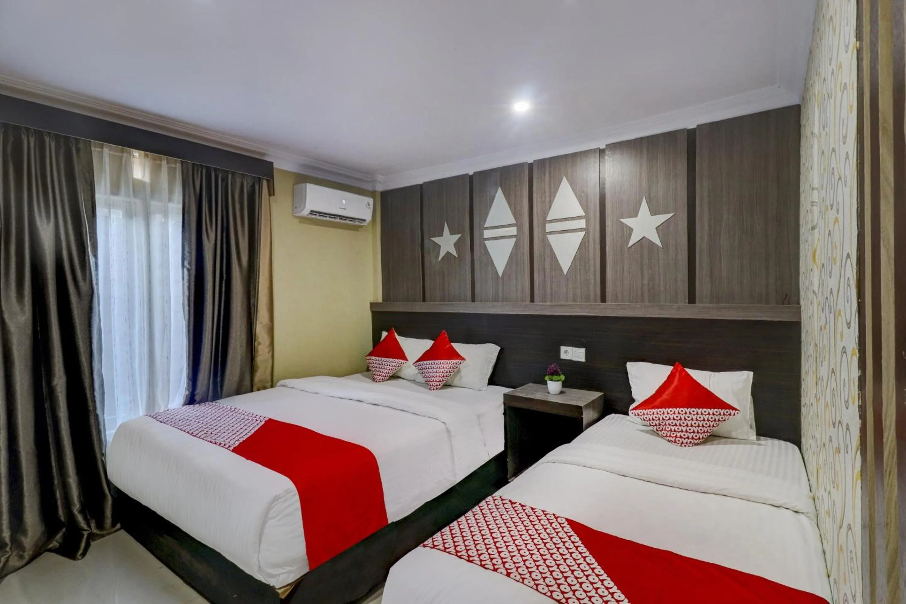 Bedroom in Collection O 90564 Hotel Merangin Syariah