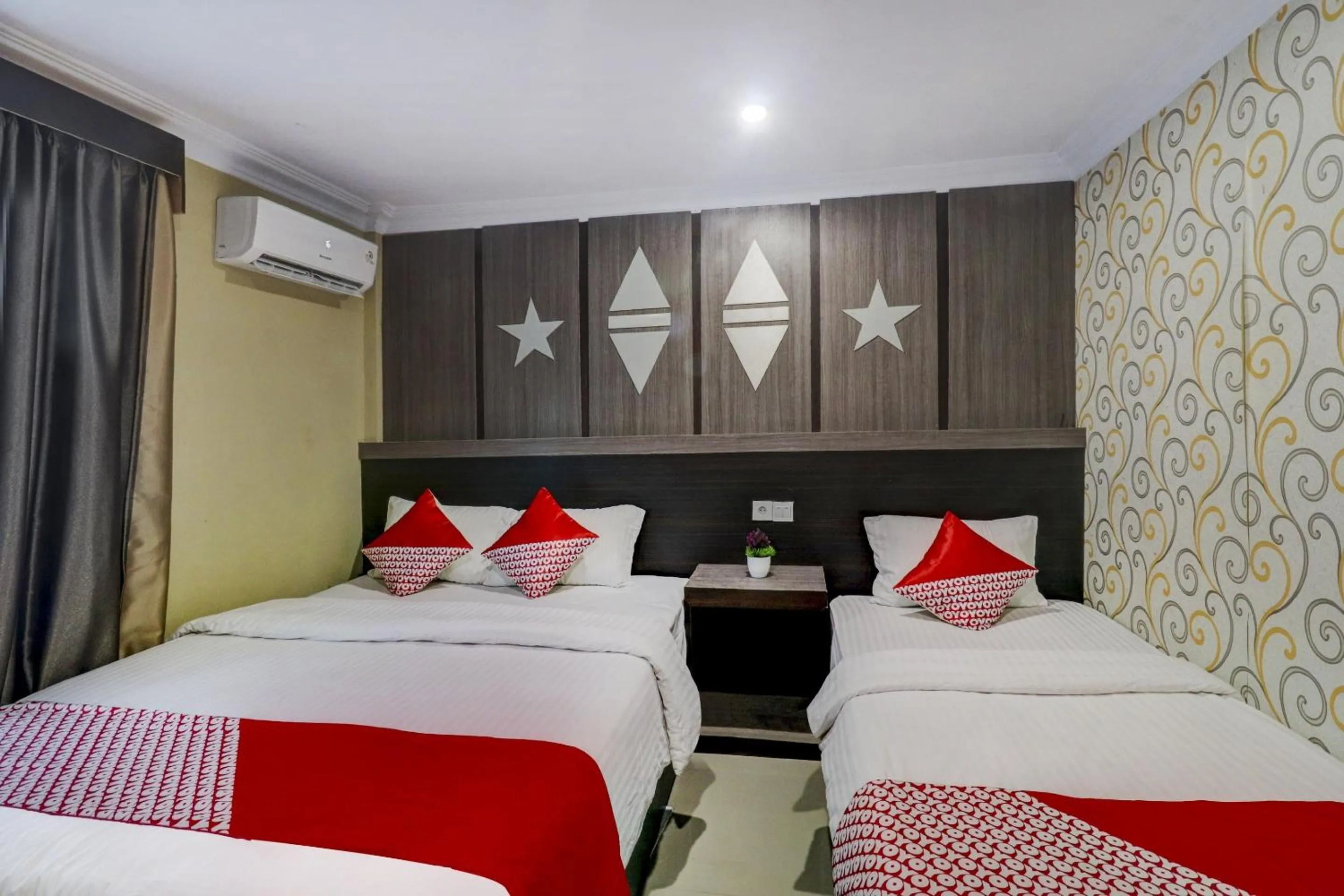 Bedroom in Collection O 90564 Hotel Merangin Syariah