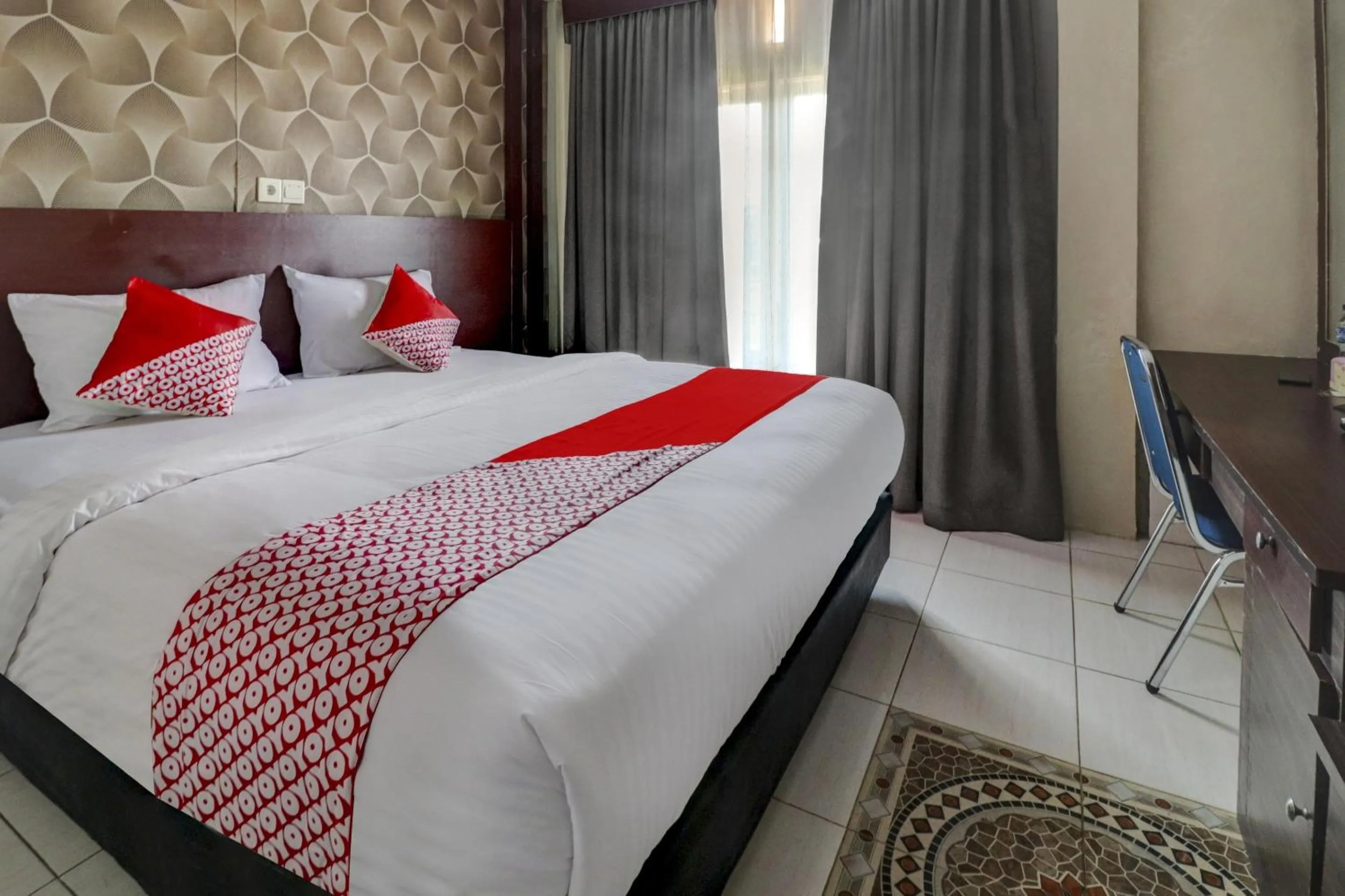 Bedroom in Collection O 90564 Hotel Merangin Syariah