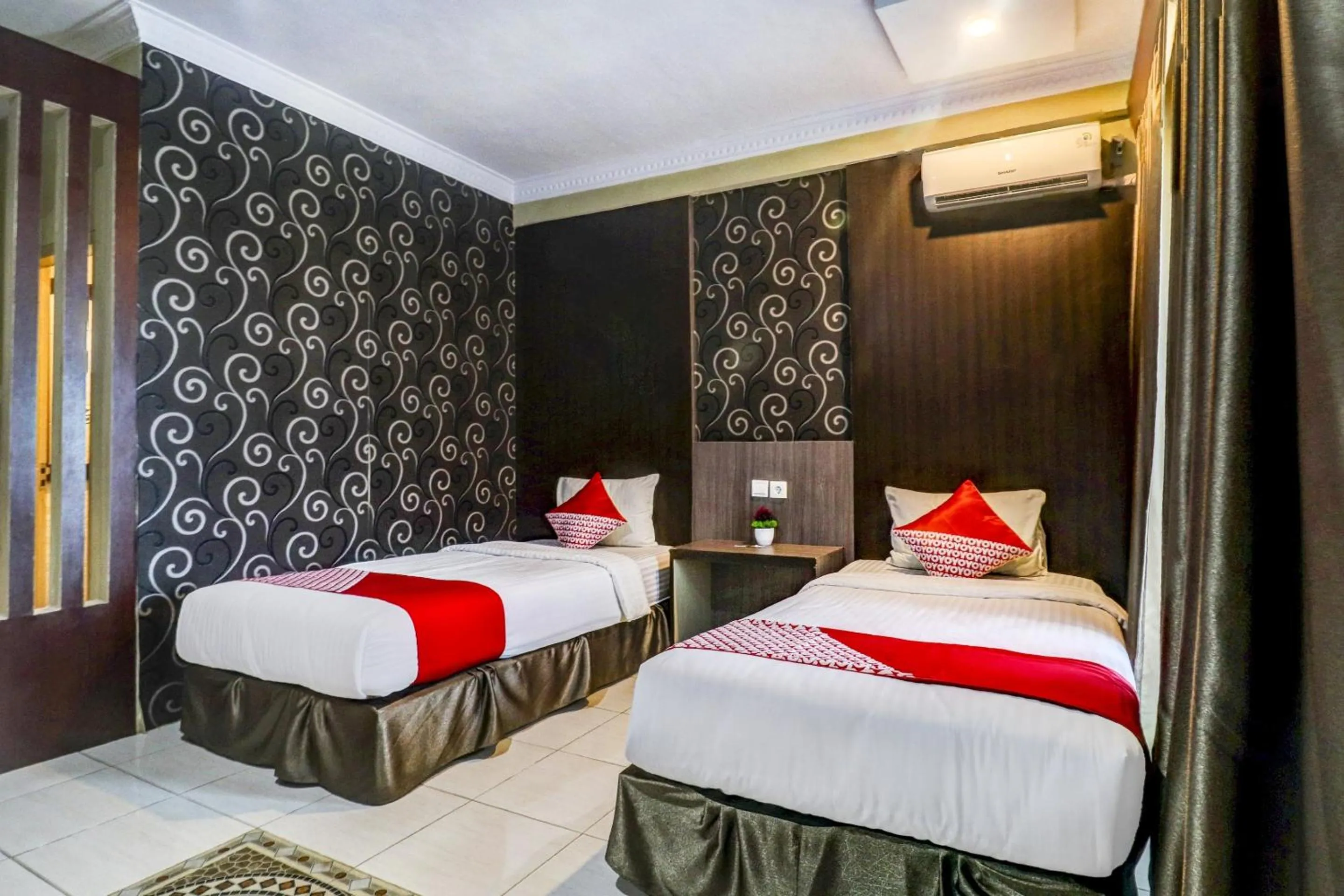 Bedroom in Collection O 90564 Hotel Merangin Syariah