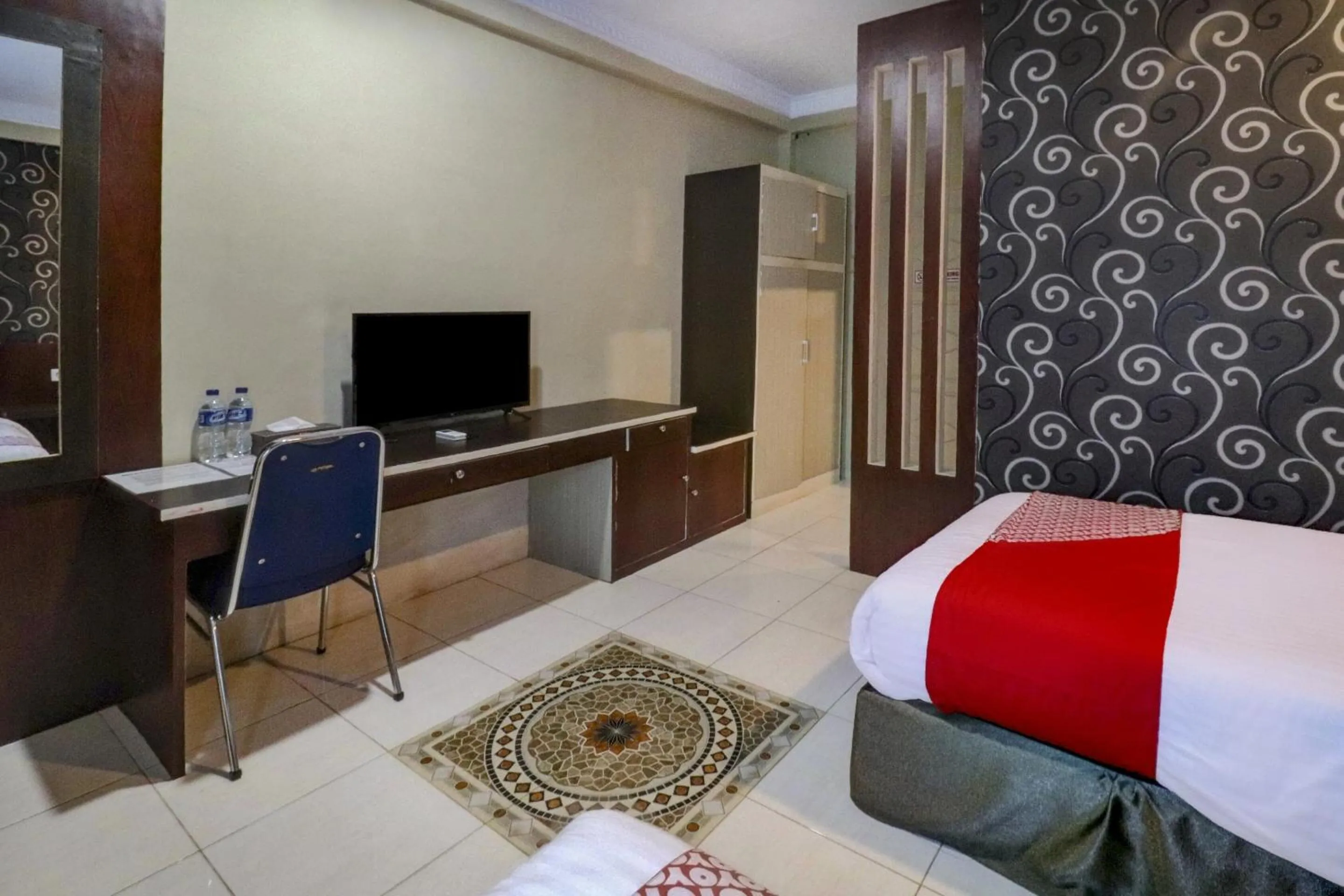 Bedroom in Collection O 90564 Hotel Merangin Syariah