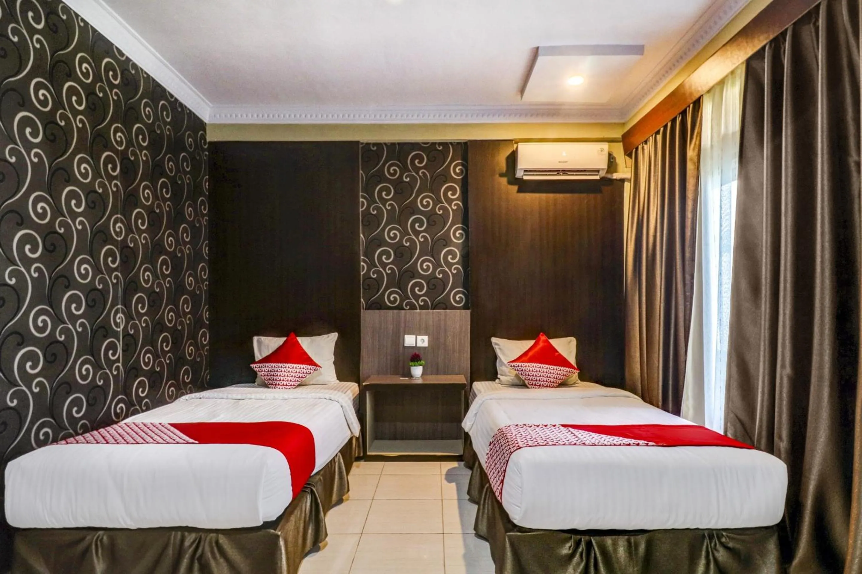 Bedroom in Collection O 90564 Hotel Merangin Syariah