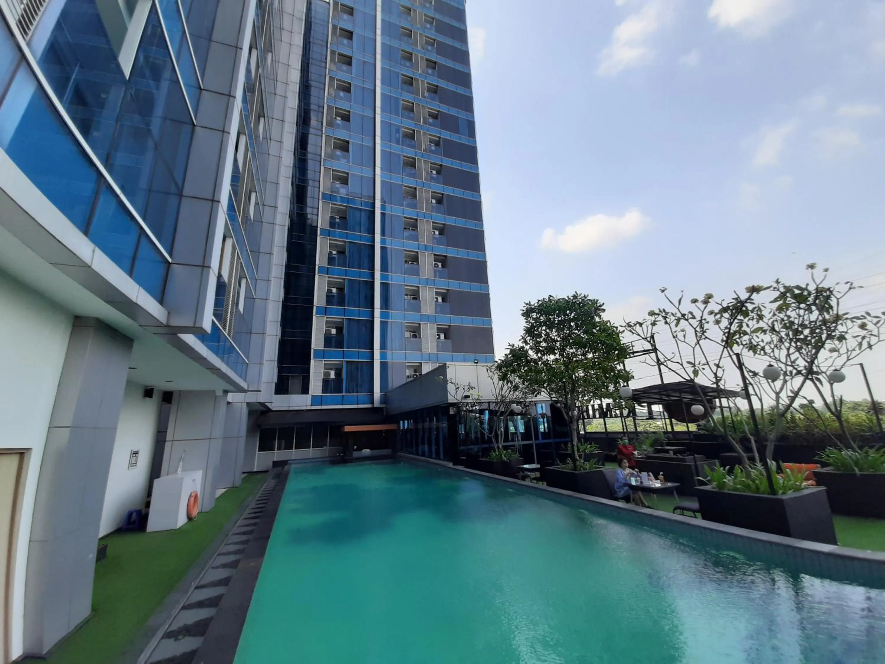Swimming pool in Cozy Tamansari Hive Cawang by Bonzela Property