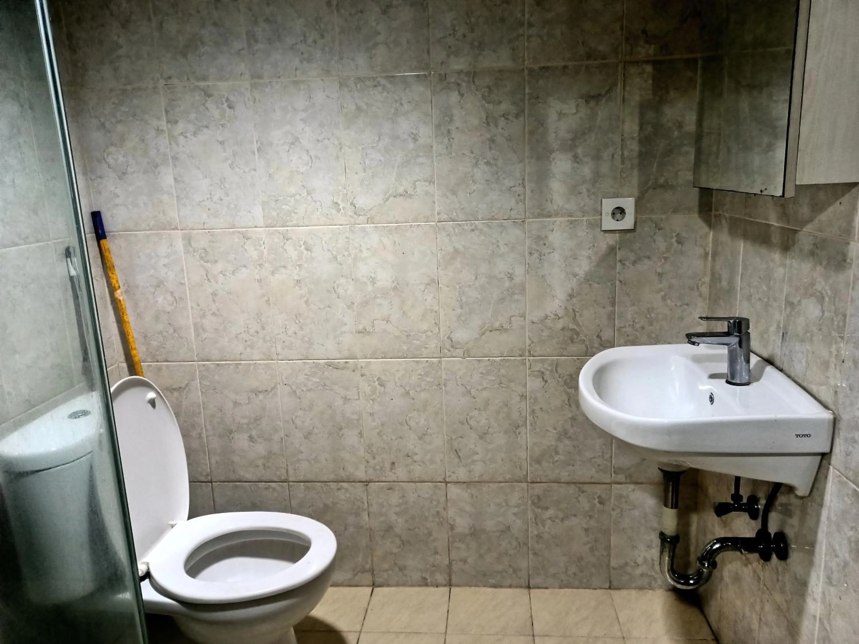 Bathroom in Cozy Tamansari Hive Cawang by Bonzela Property