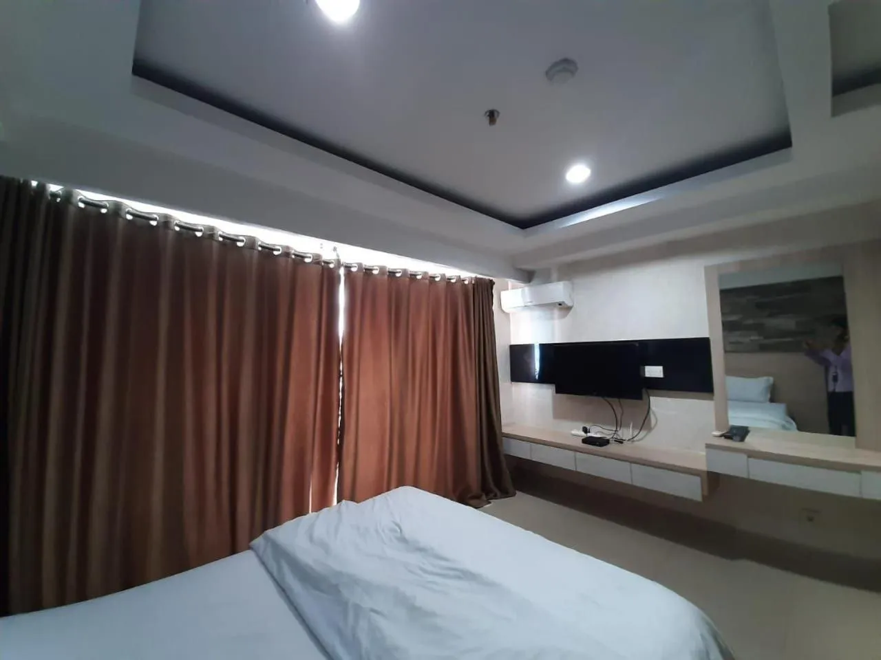 Bed in Cozy Tamansari Hive Cawang by Bonzela Property