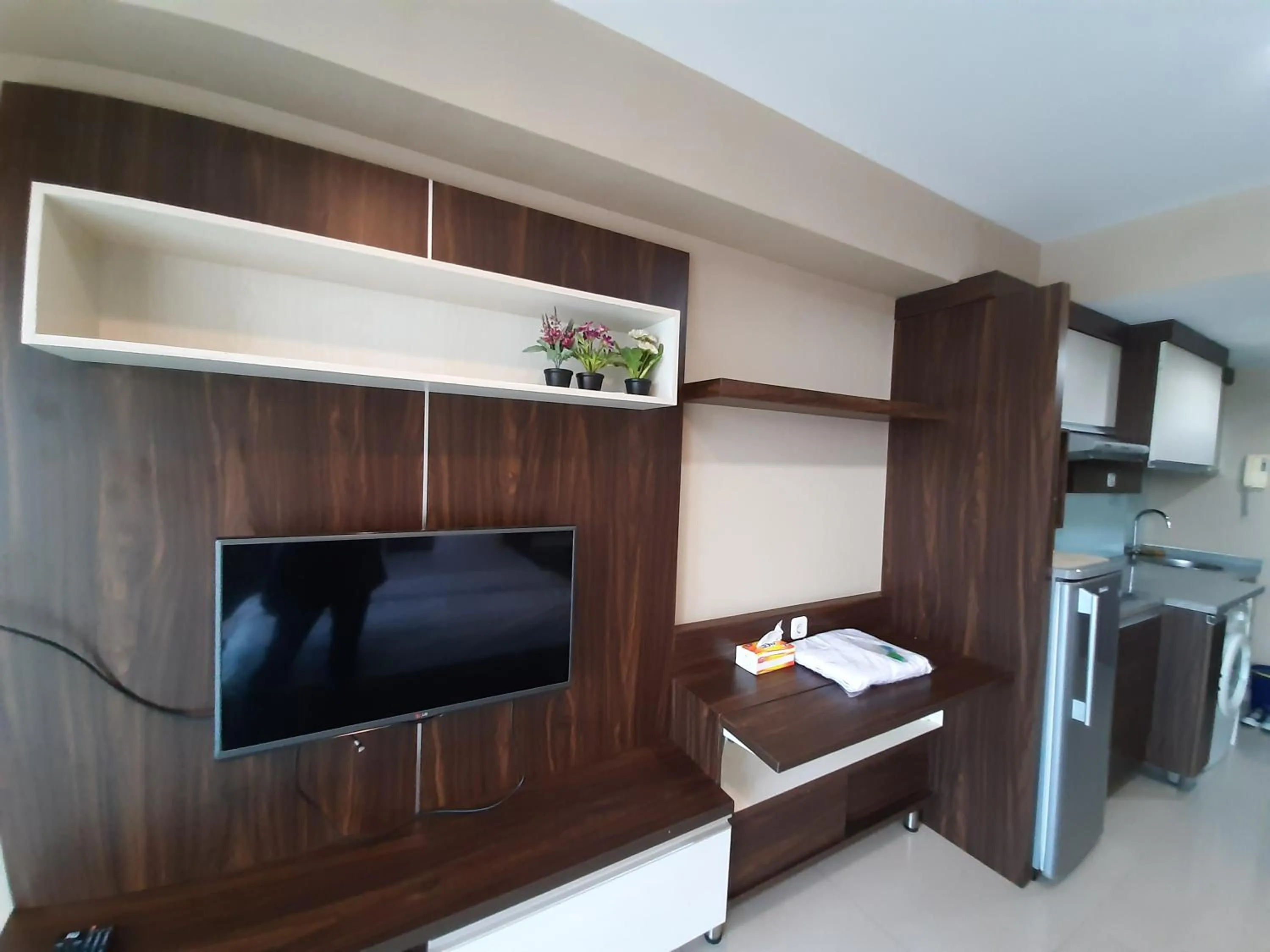 TV and multimedia in Cozy Tamansari Hive Cawang by Bonzela Property