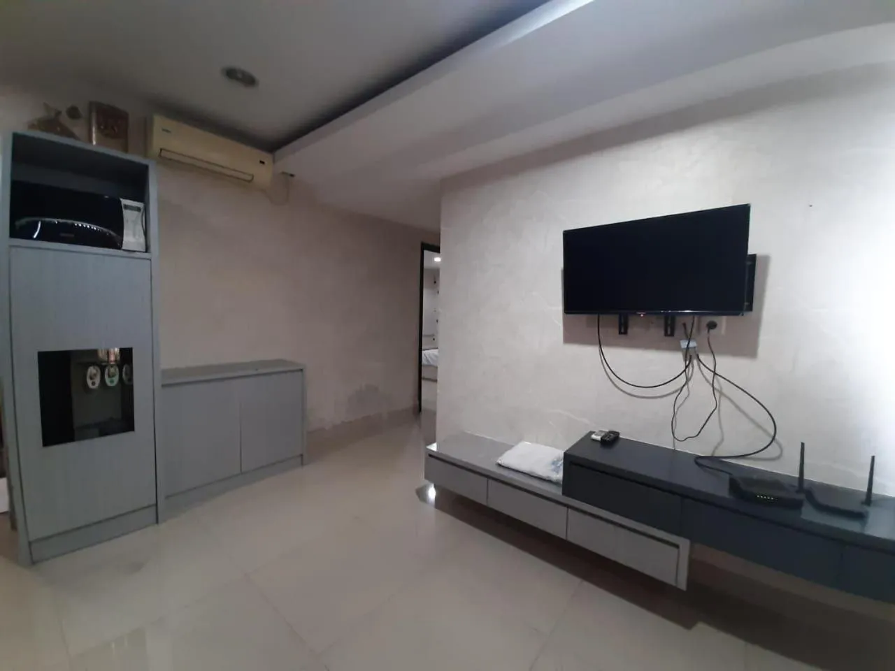 TV and multimedia in Cozy Tamansari Hive Cawang by Bonzela Property