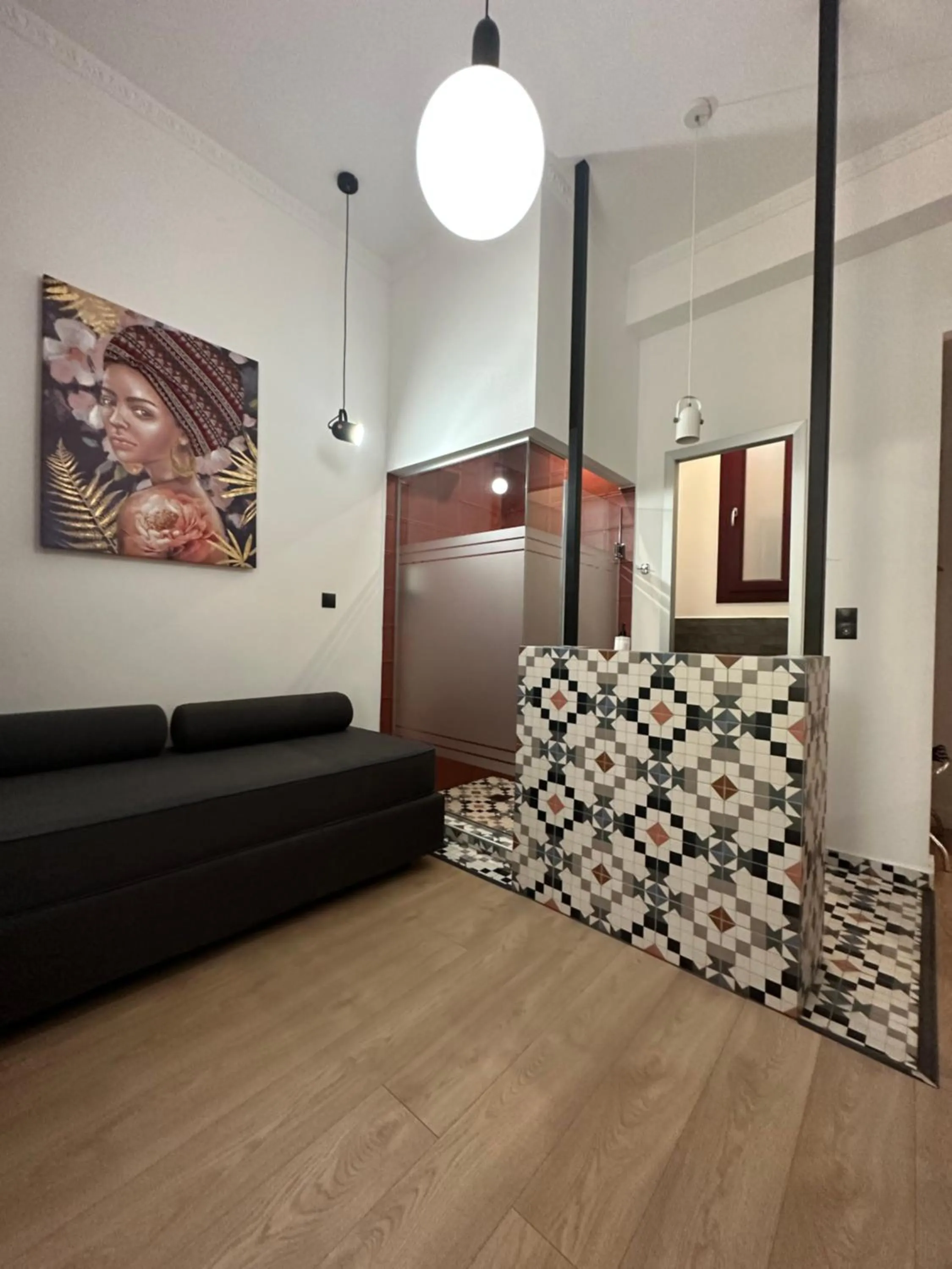 Shower in The Maroon Bottle Luxury Suites