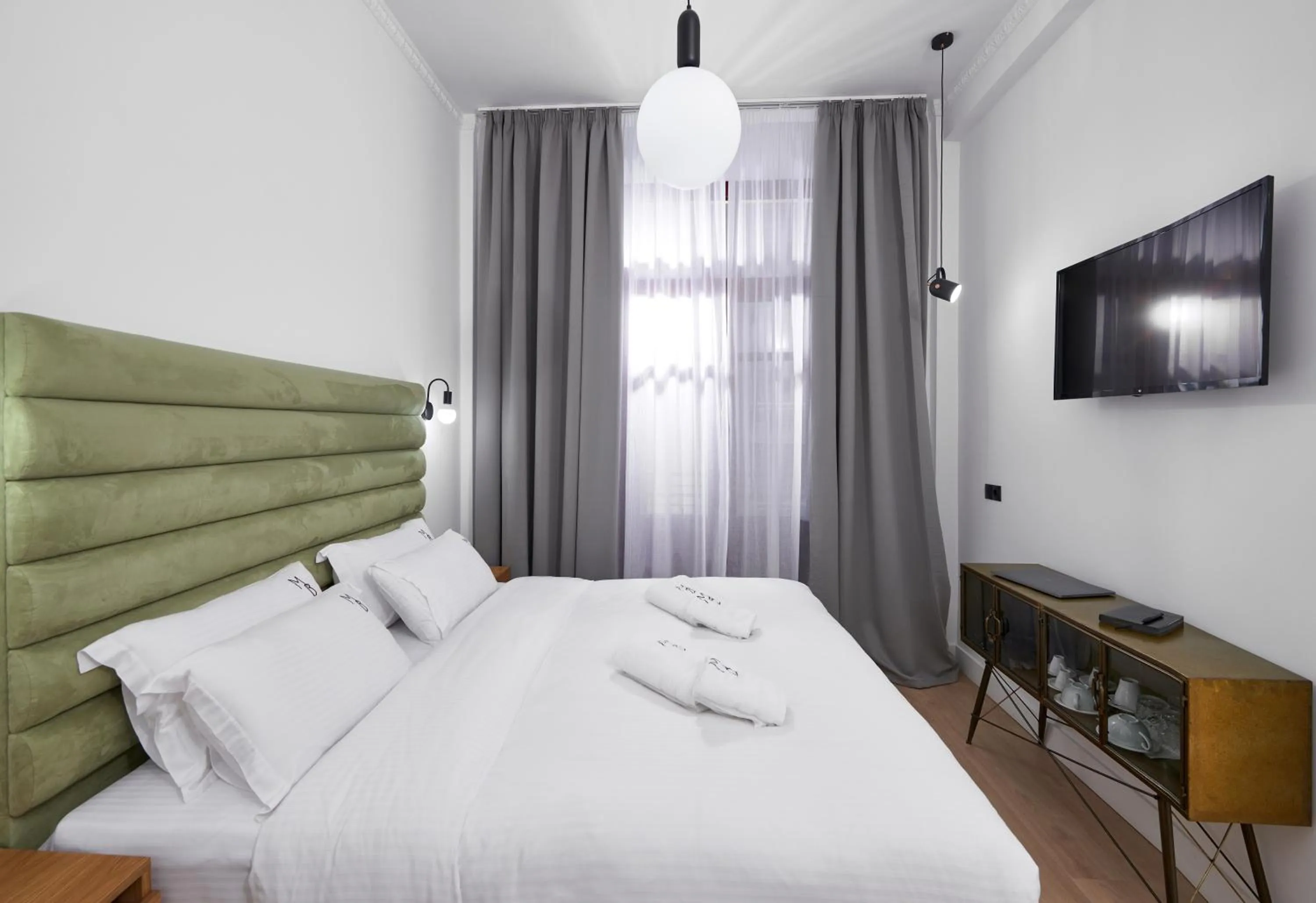 Toilet, Bed in The Maroon Bottle Luxury Suites