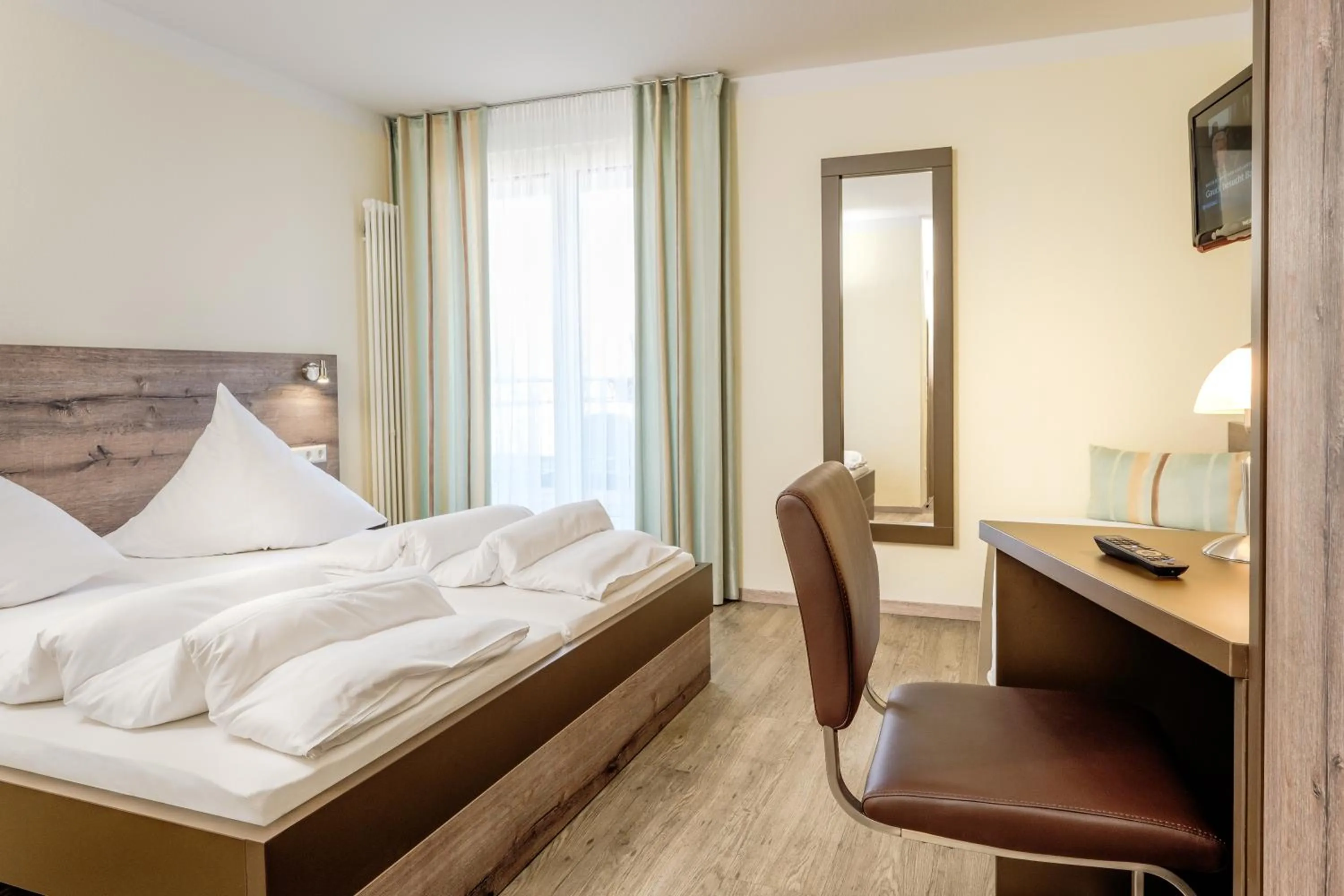 Photo of the whole room, Bed in Hotel Mythos