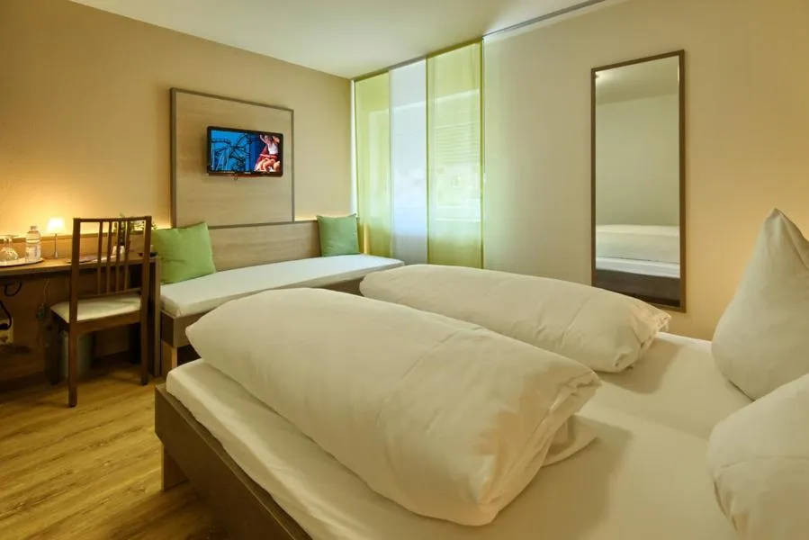 Photo of the whole room, Bed in Hotel Mythos