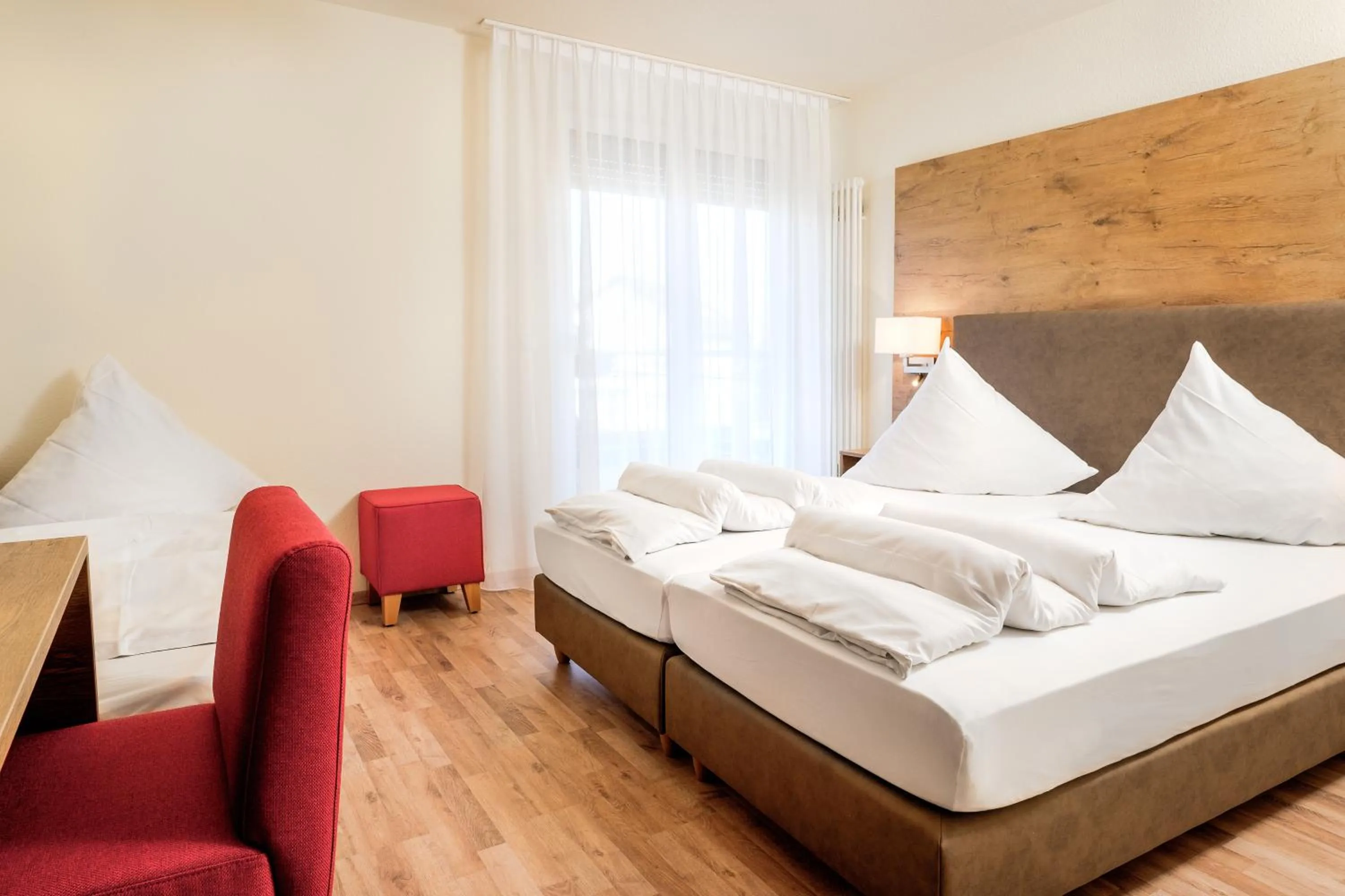 Photo of the whole room, Bed in Hotel Mythos