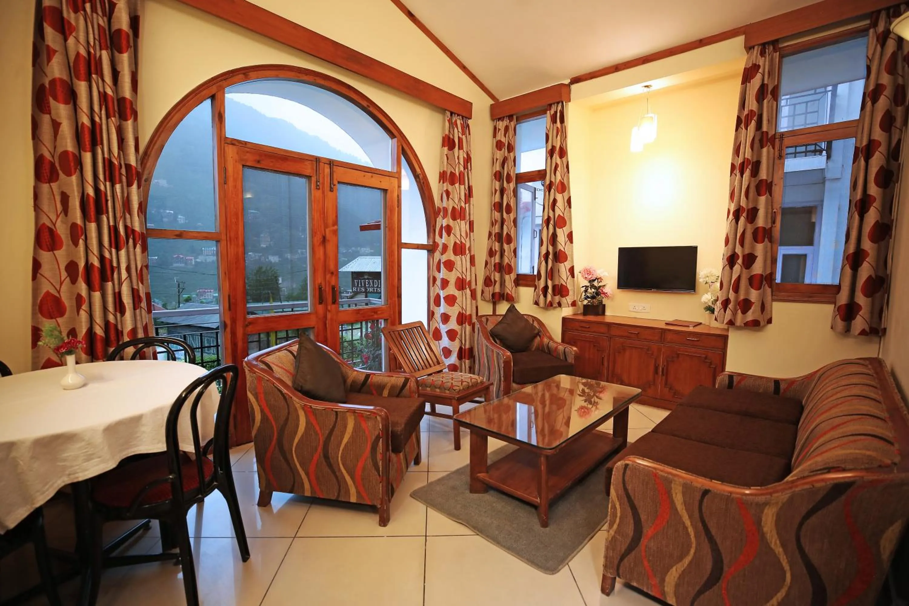 TV and multimedia in De Vivendi Resorts, Manali with 35000 Sqft Open Lawn