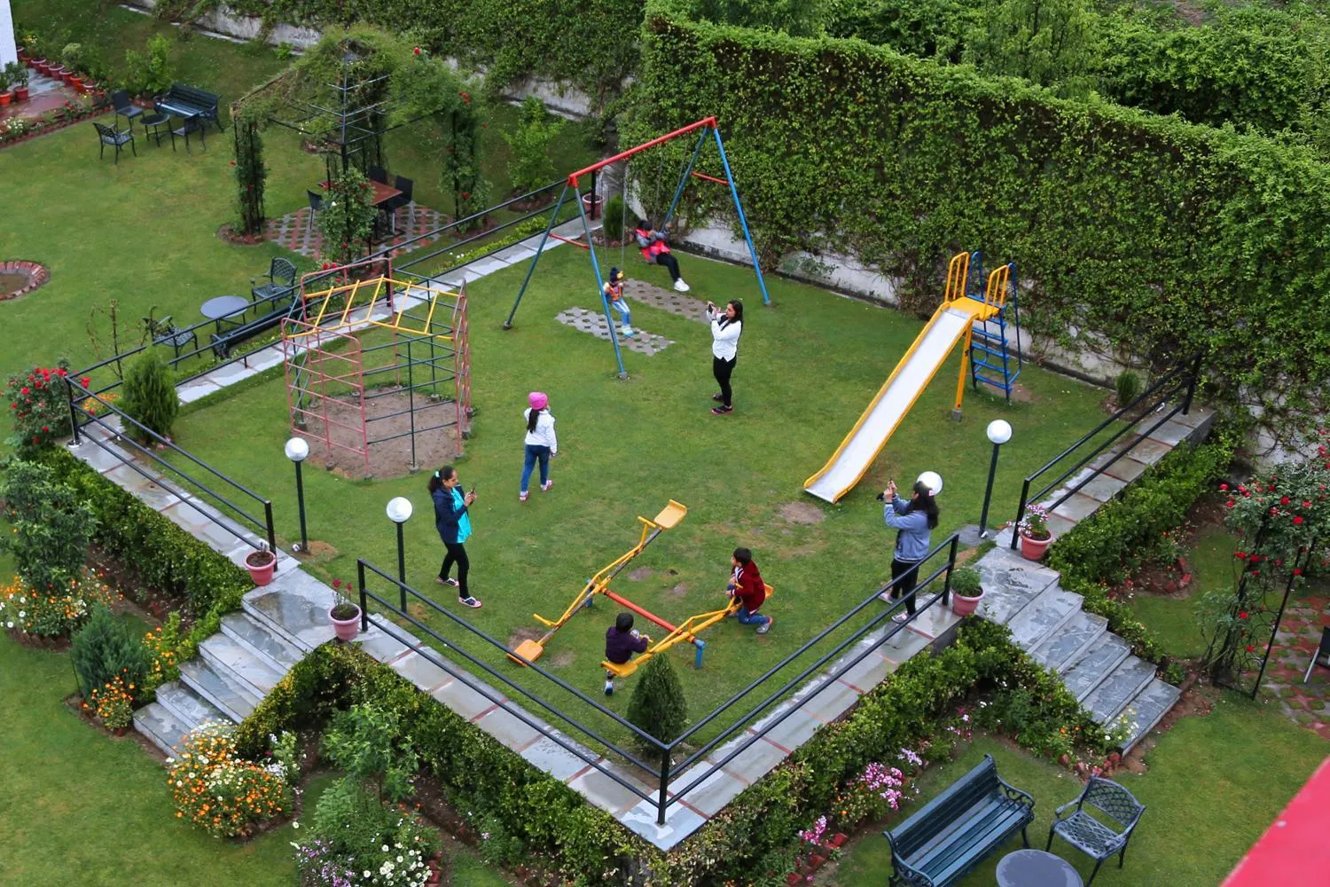 Children play ground in De Vivendi Resorts, Manali with 35000 Sqft Open Lawn