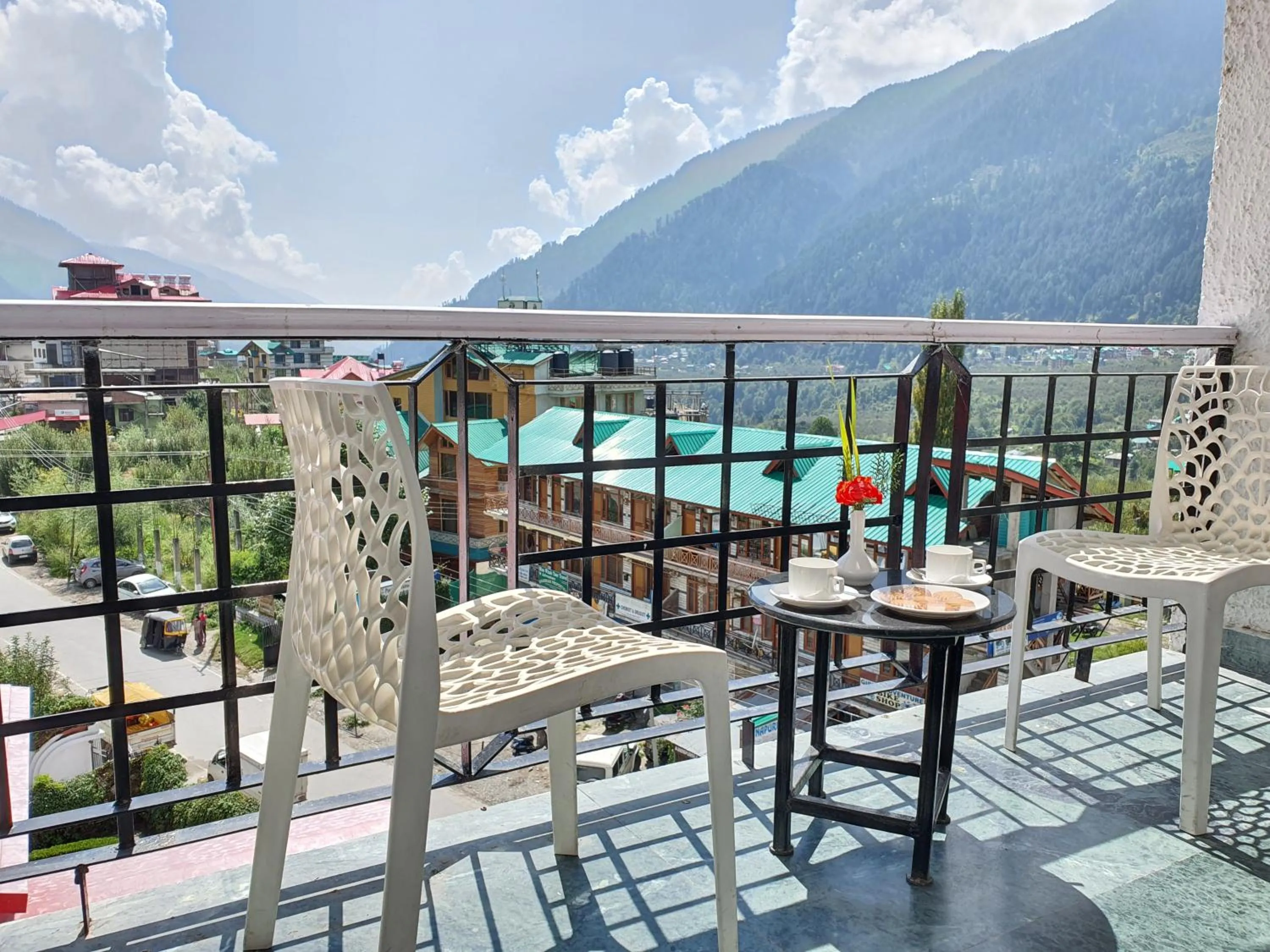 Seating area in De Vivendi Resorts, Manali with 35000 Sqft Open Lawn
