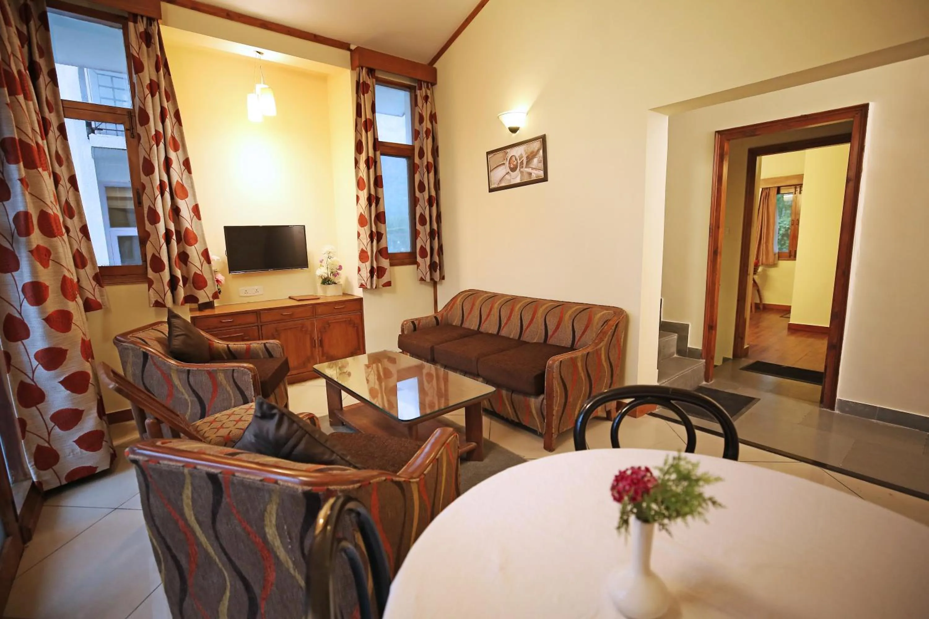 TV and multimedia in De Vivendi Resorts, Manali with 35000 Sqft Open Lawn