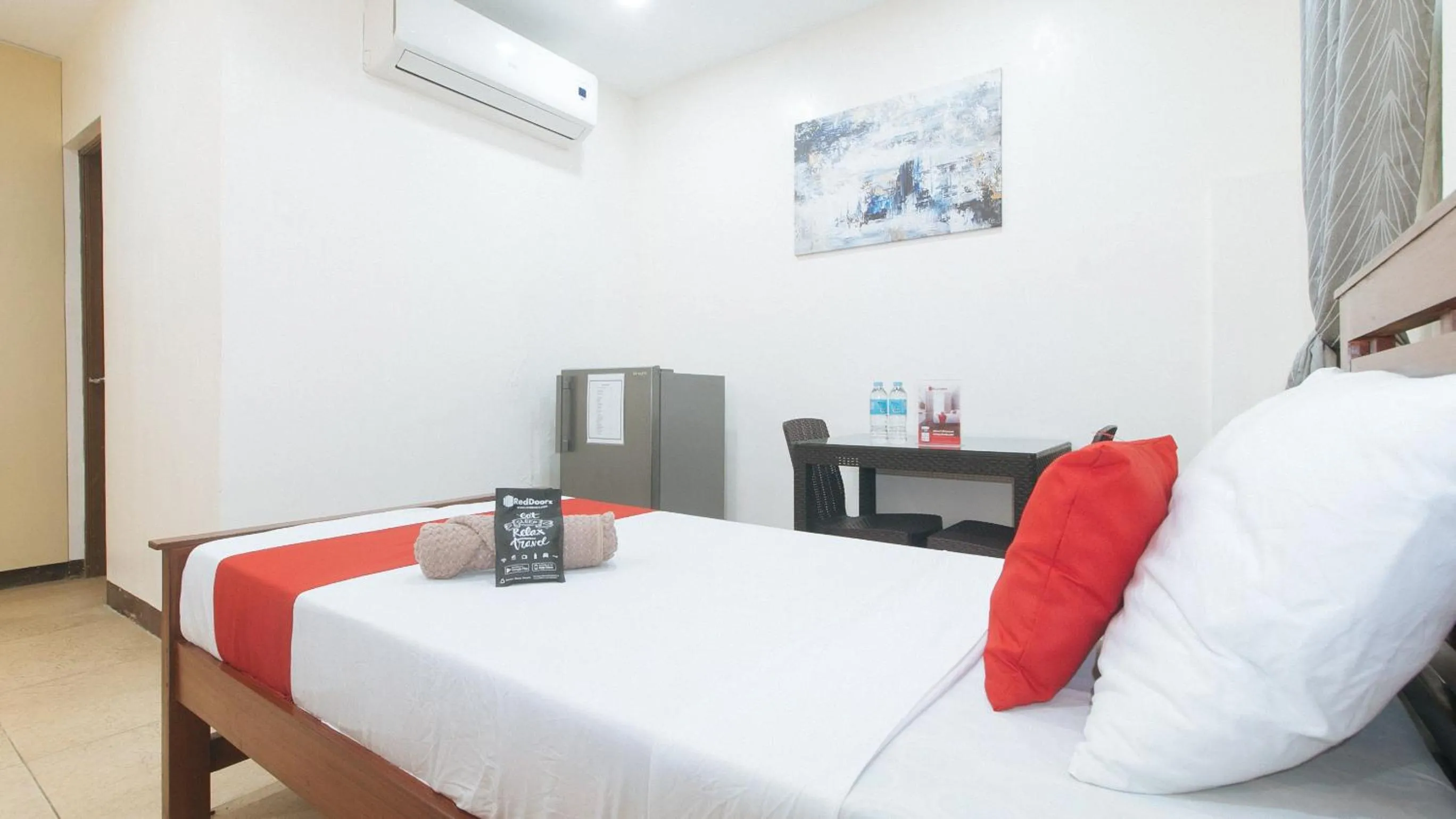air conditioner, Bed in RedDoorz at RJs Bldg near Lyceum Gen Trias Cavite