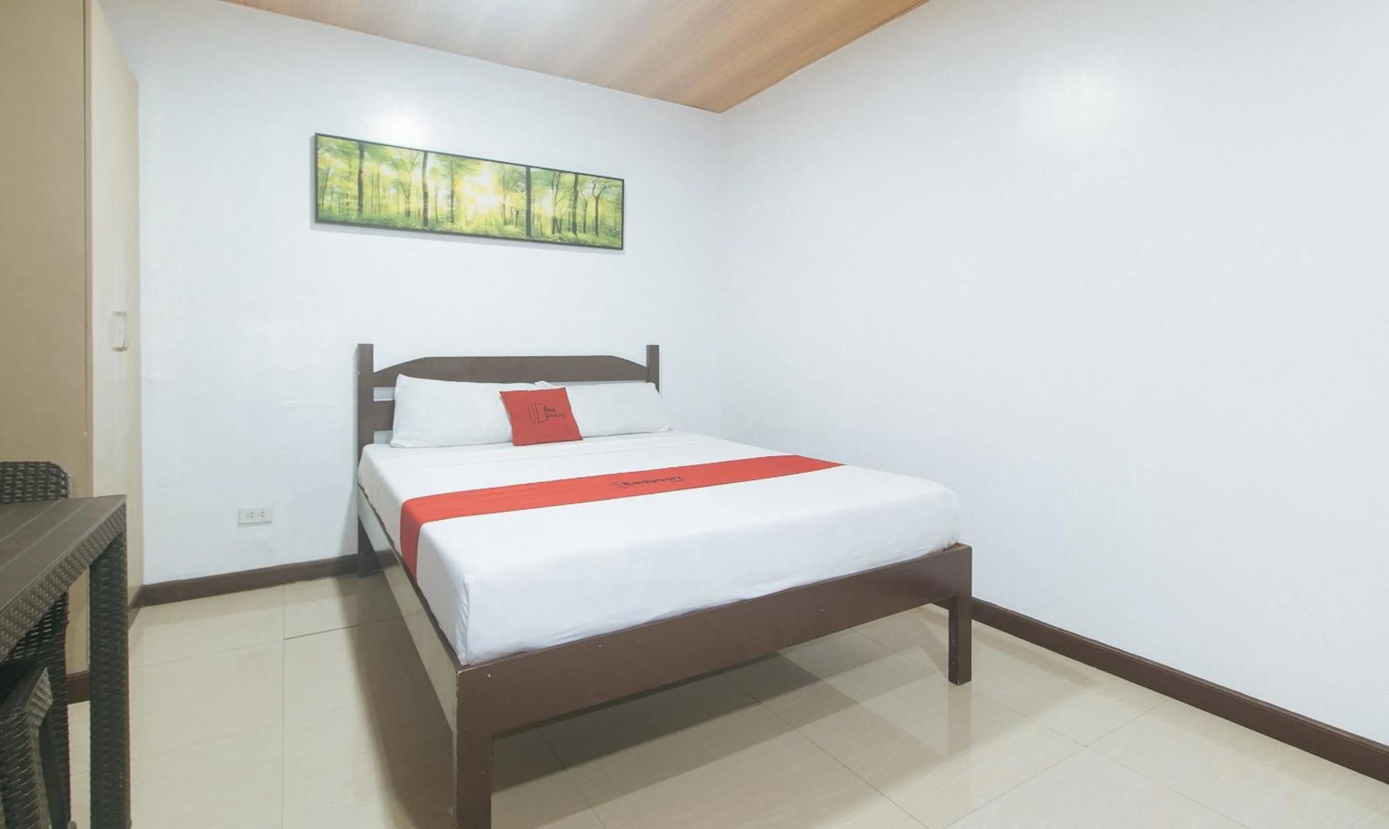 Photo of the whole room, Bed in RedDoorz at RJs Bldg near Lyceum Gen Trias Cavite