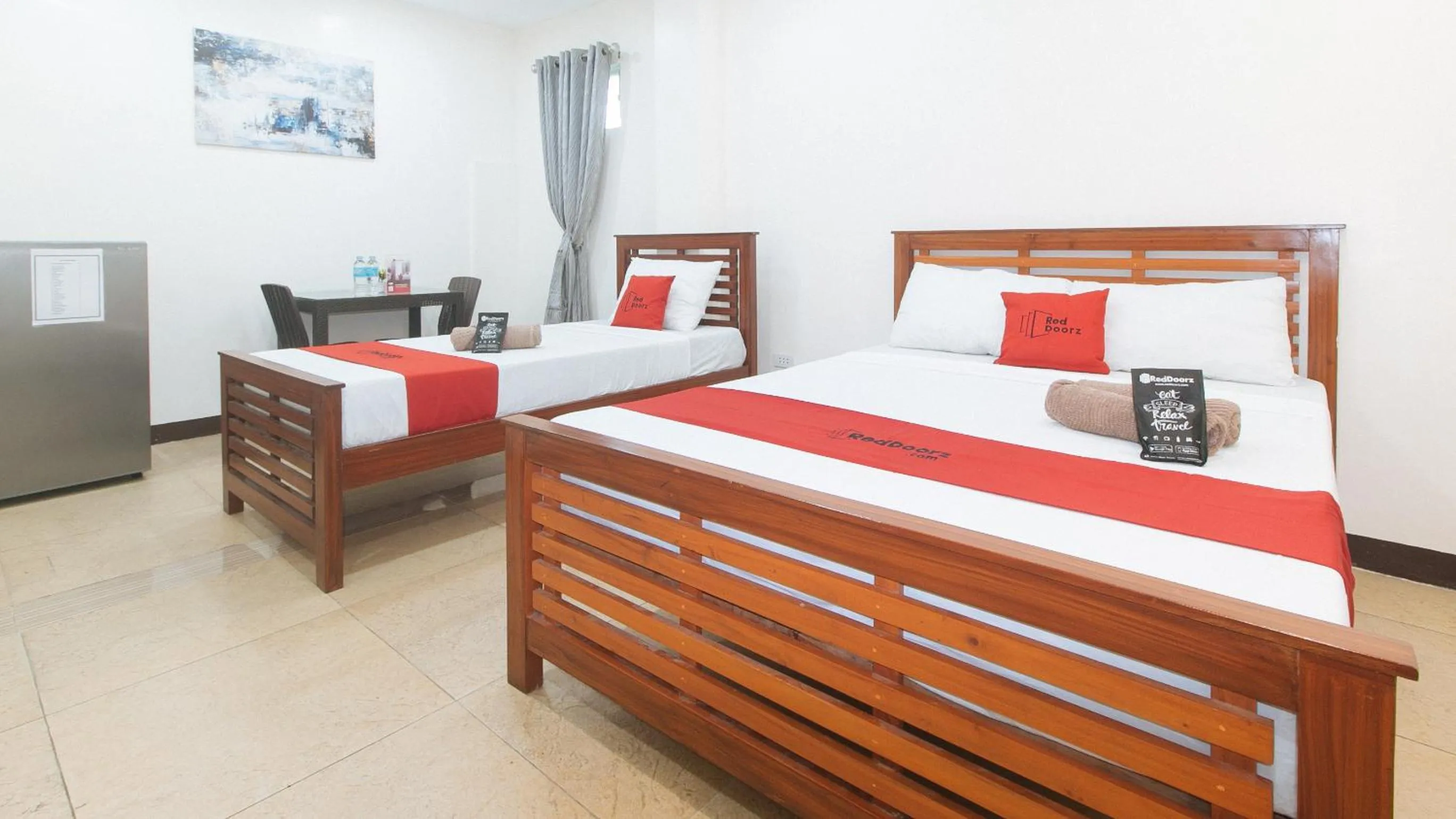 Photo of the whole room, Bed in RedDoorz at RJs Bldg near Lyceum Gen Trias Cavite