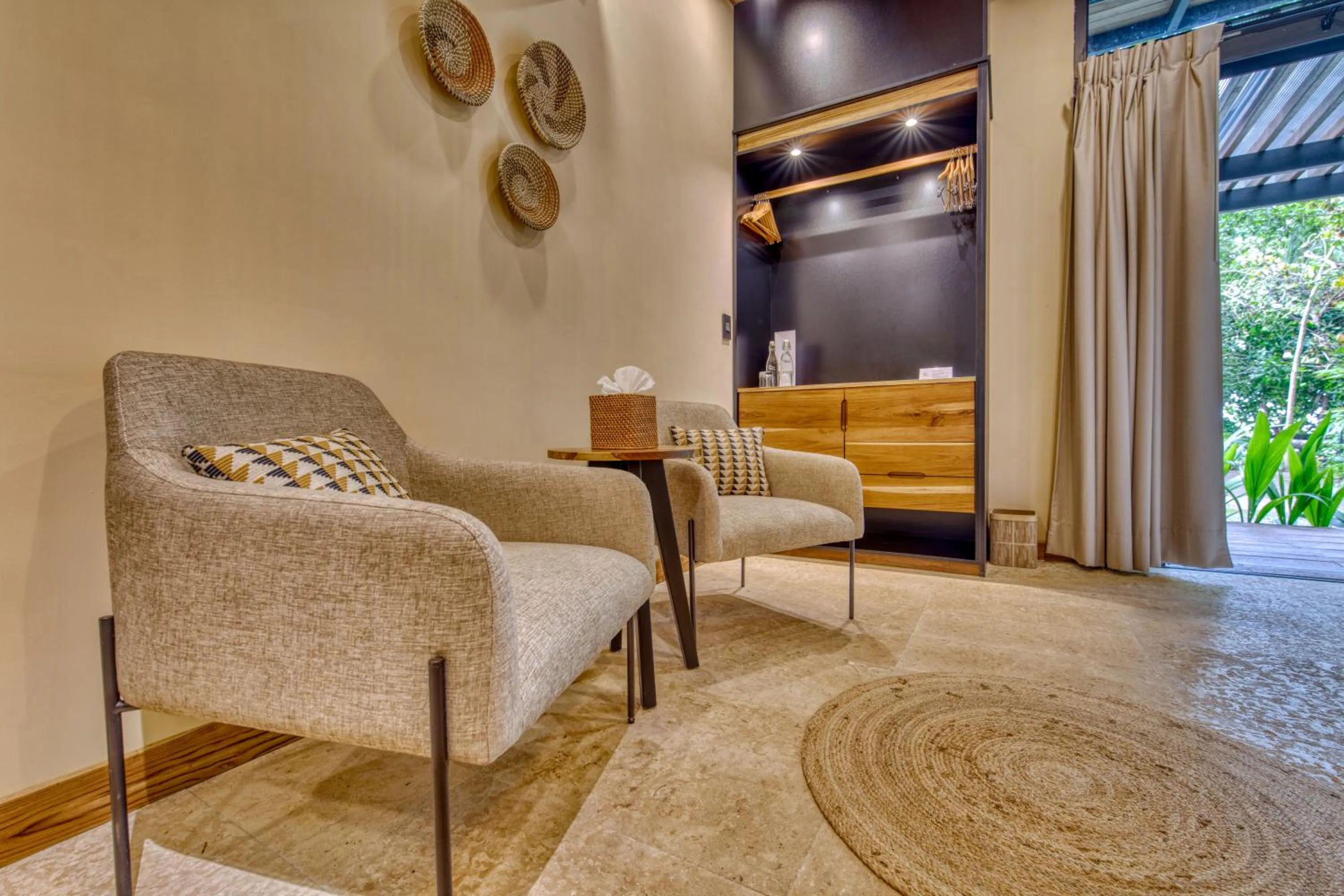 Seating area in awā Beachfront Hotel