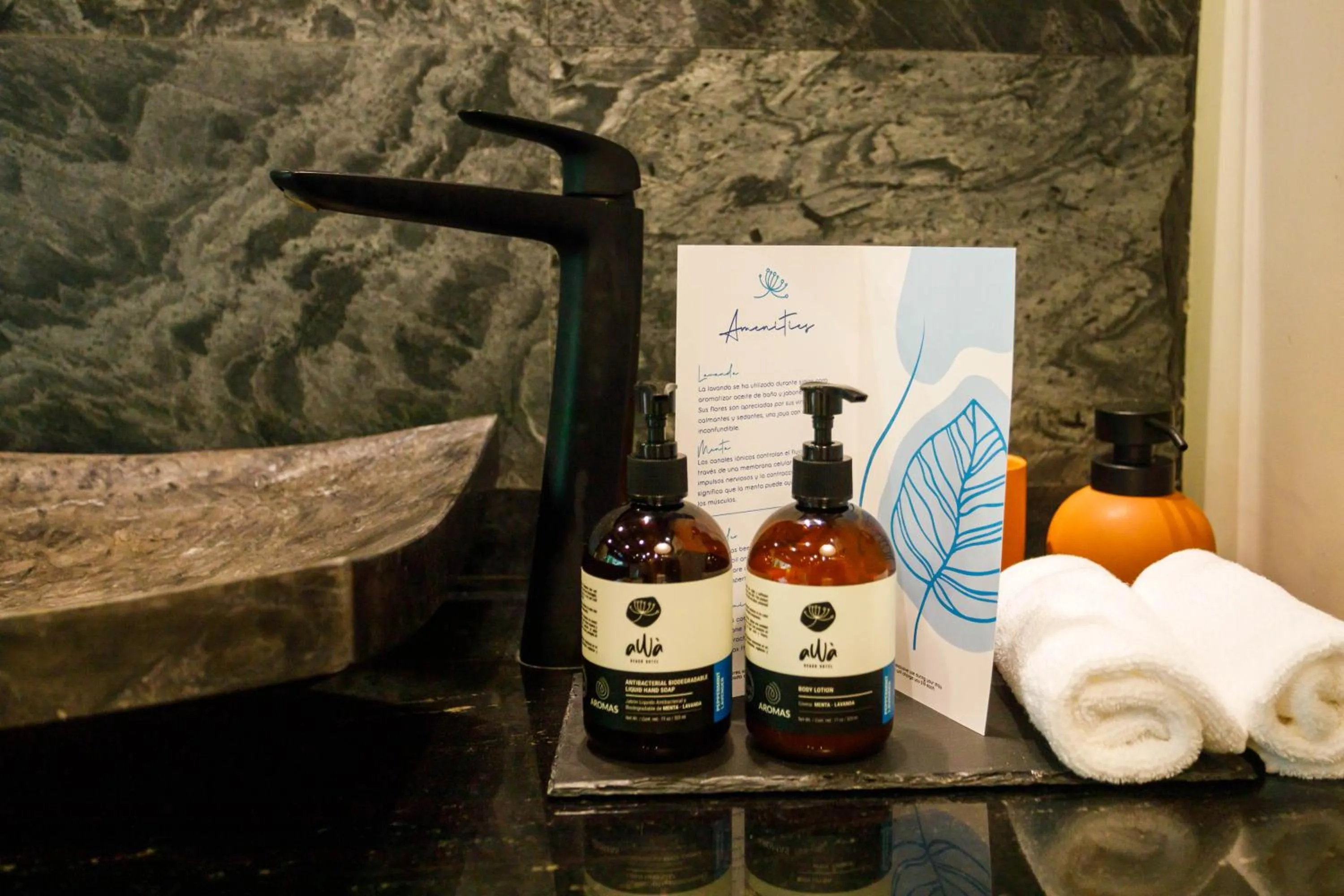 Bathroom in awā Beachfront Hotel