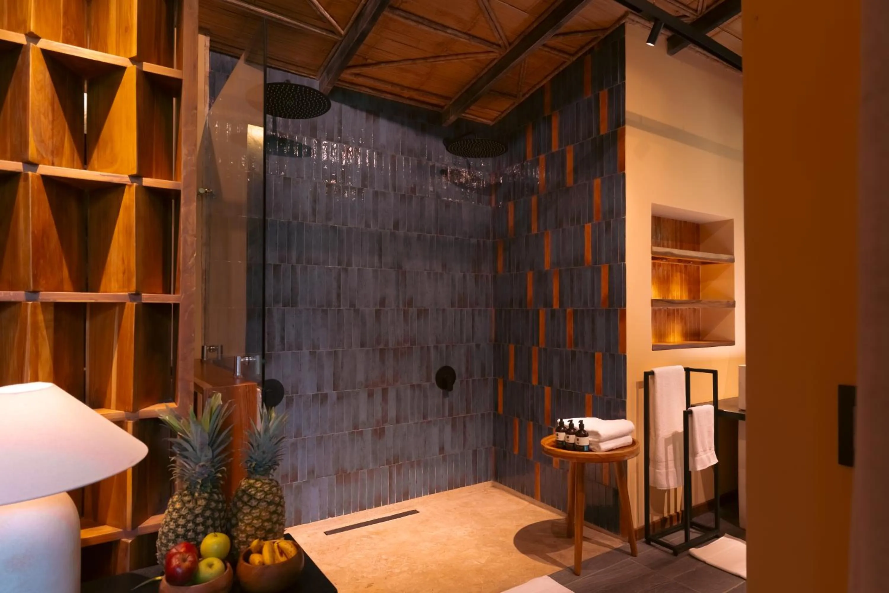 Bathroom, Bed in awā Beachfront Hotel