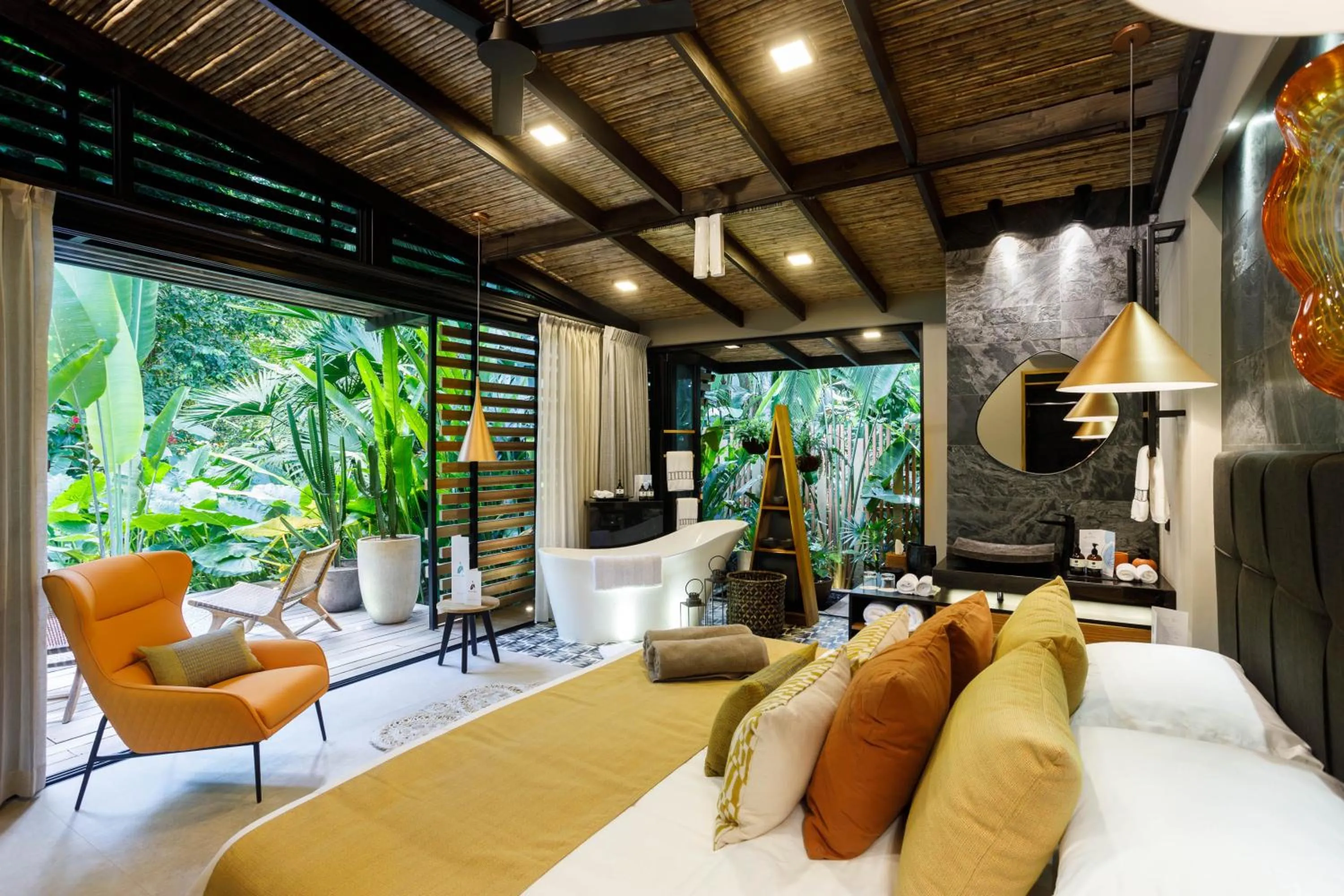 Bedroom in awā Beachfront Hotel