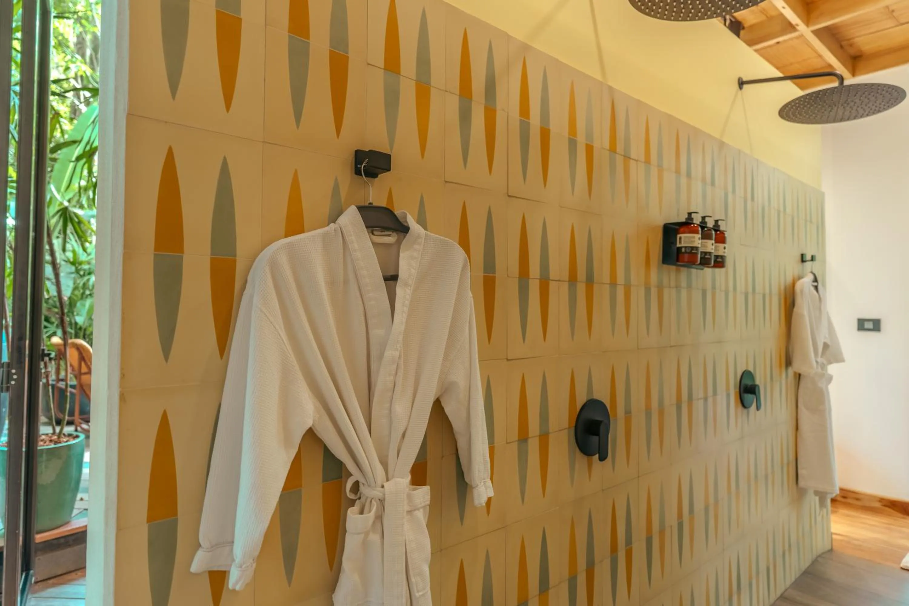 Bathroom in awā Beachfront Hotel