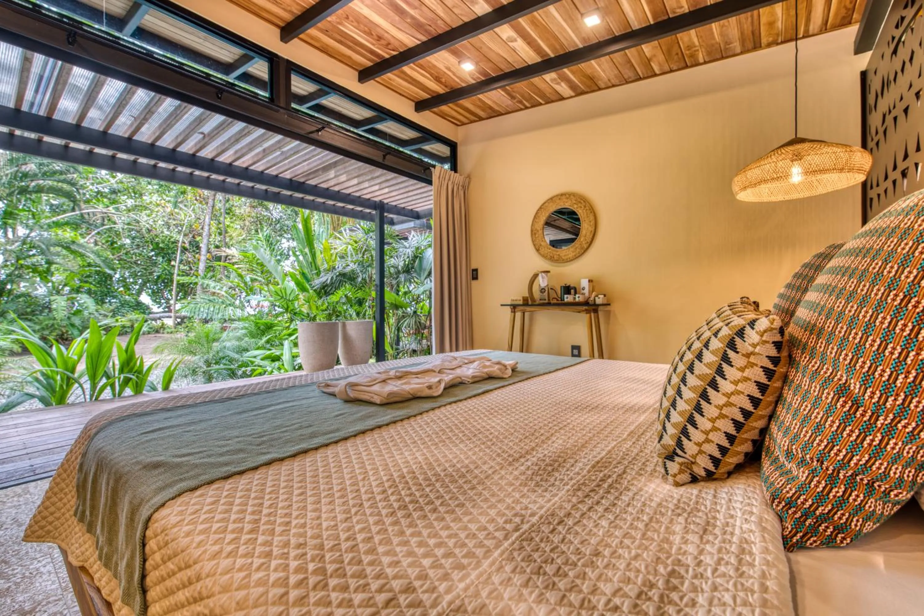 Bed in awā Beachfront Hotel