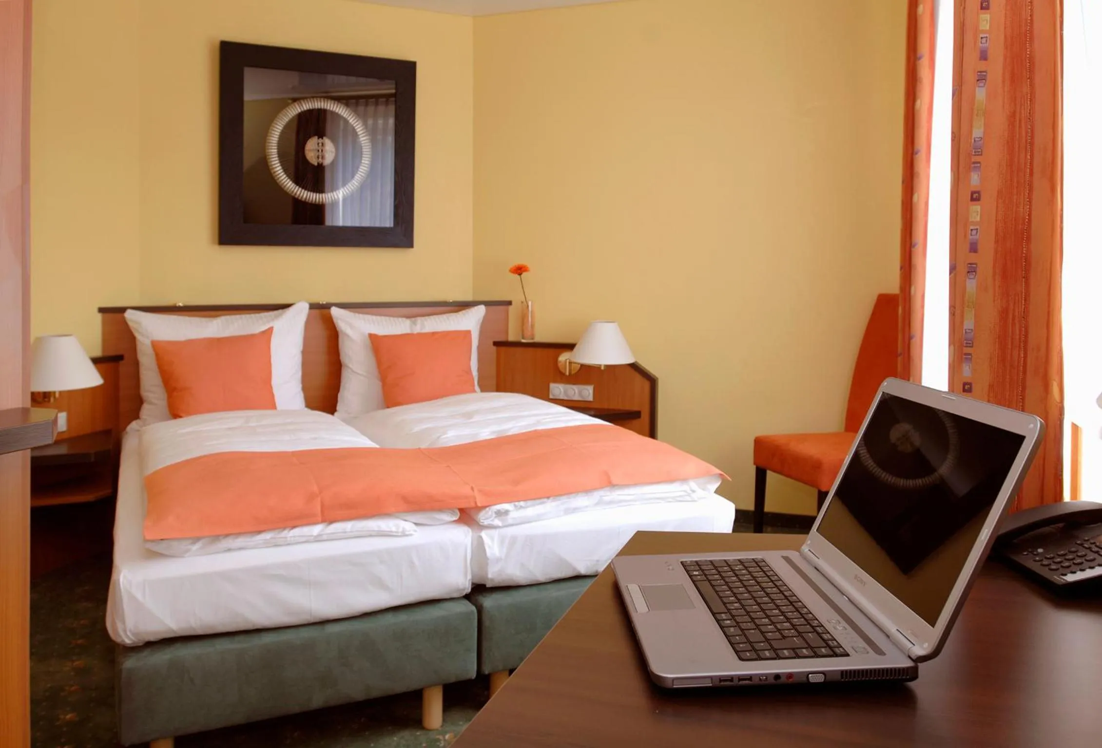 Photo of the whole room, Bed in Hotel Sperling mit E-Ladestation