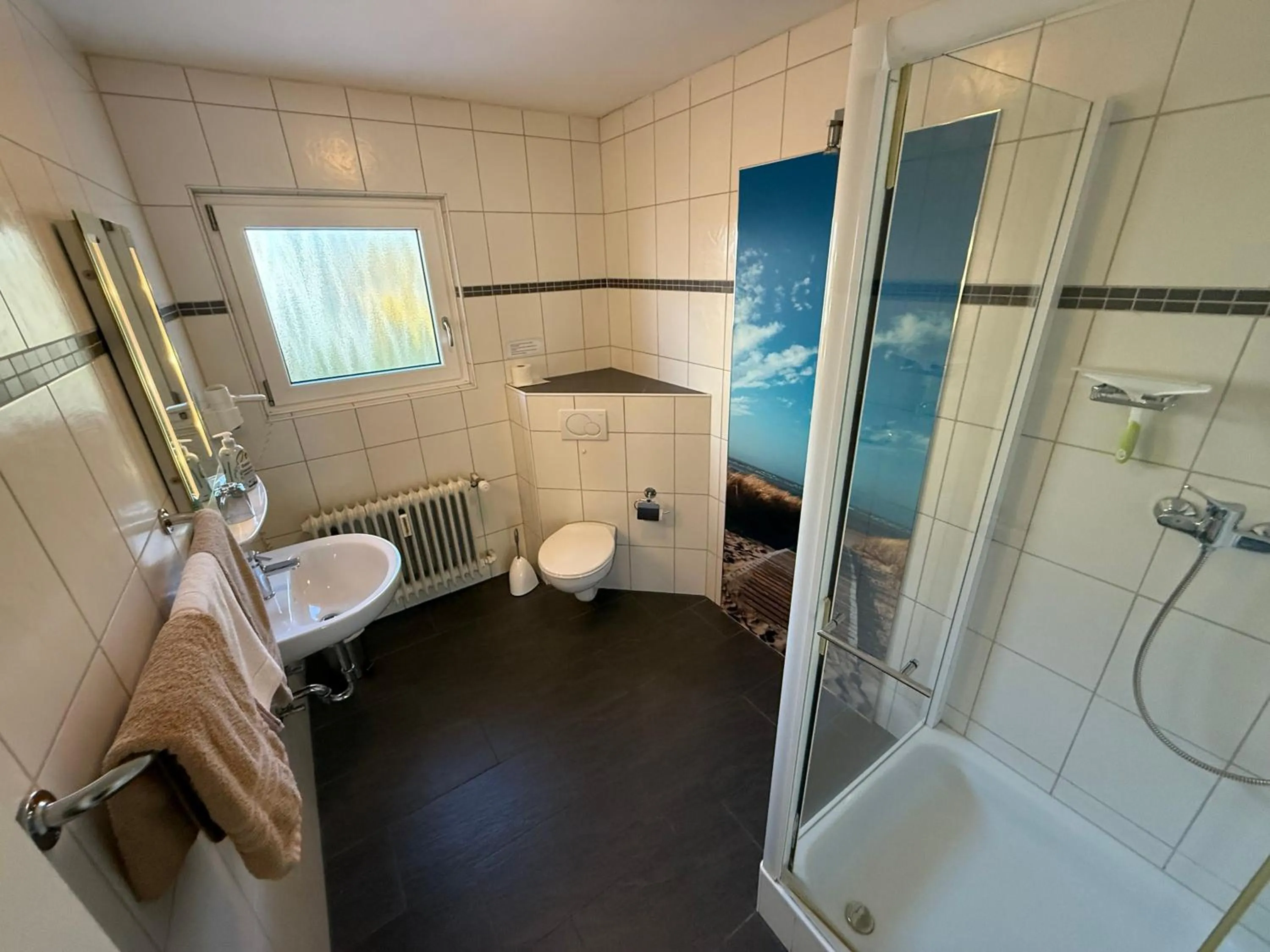 Toilet in Hotel am Hindenburgplatz