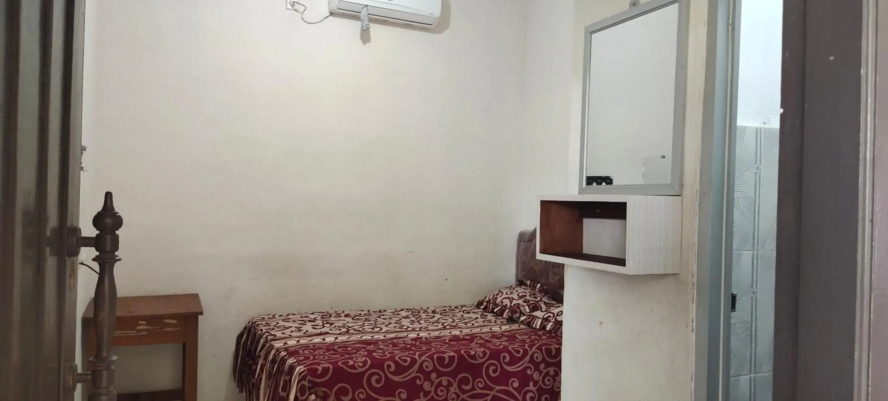 Bed in penginapan karanglaut santolo Bed in penginapan karanglaut santolo