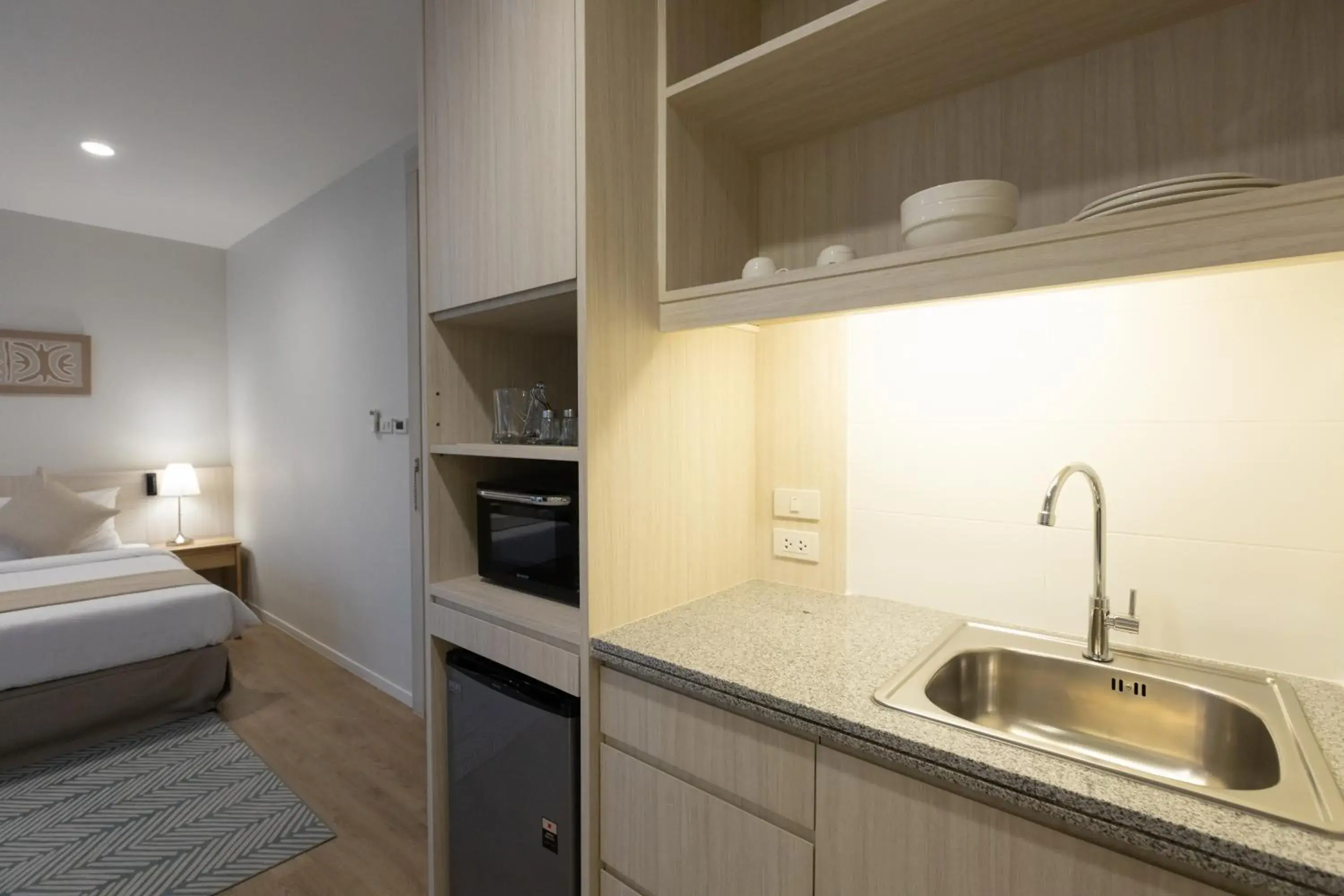 Kitchen or kitchenette, Bed in Kantary Hotel Banchang Kitchen or kitchenette, Bed in Kantary Hotel Banchang