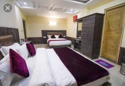 Bedroom, Bed in Vella Marina Group of Hotels Mount-Hotels Best Prices Guaranteed with Deals- Free Parking-cricket stadium 10 km-Mcleodganj 2 km- Bhagsunag 4 km