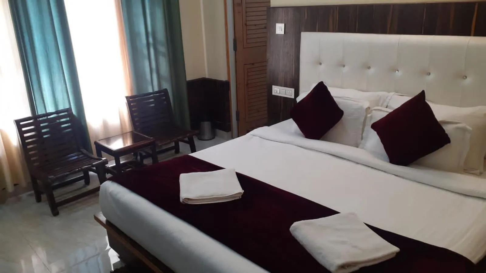 Bedroom, Bed in Vella Marina Group of Hotels Mount-Hotels Best Prices Guaranteed with Deals- Free Parking-cricket stadium 10 km-Mcleodganj 2 km- Bhagsunag 4 km