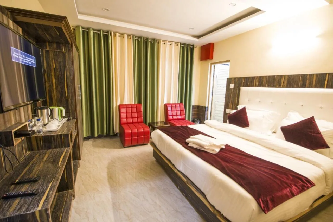 Bedroom, Bed in Vella Marina Group of Hotels Mount-Hotels Best Prices Guaranteed with Deals- Free Parking-cricket stadium 10 km-Mcleodganj 2 km- Bhagsunag 4 km
