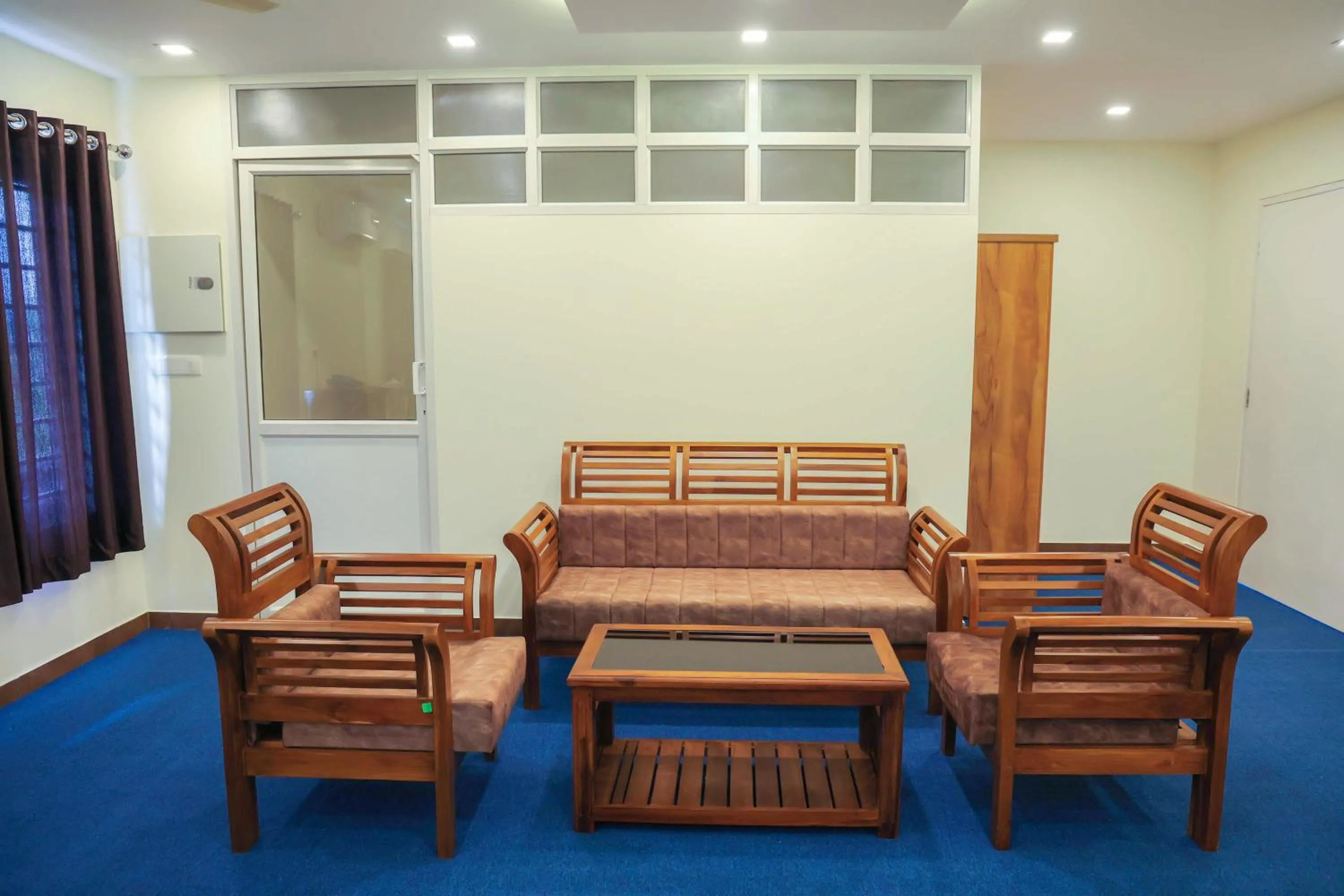 Seating area in Treebo Golden Terminal, Kochi Airport