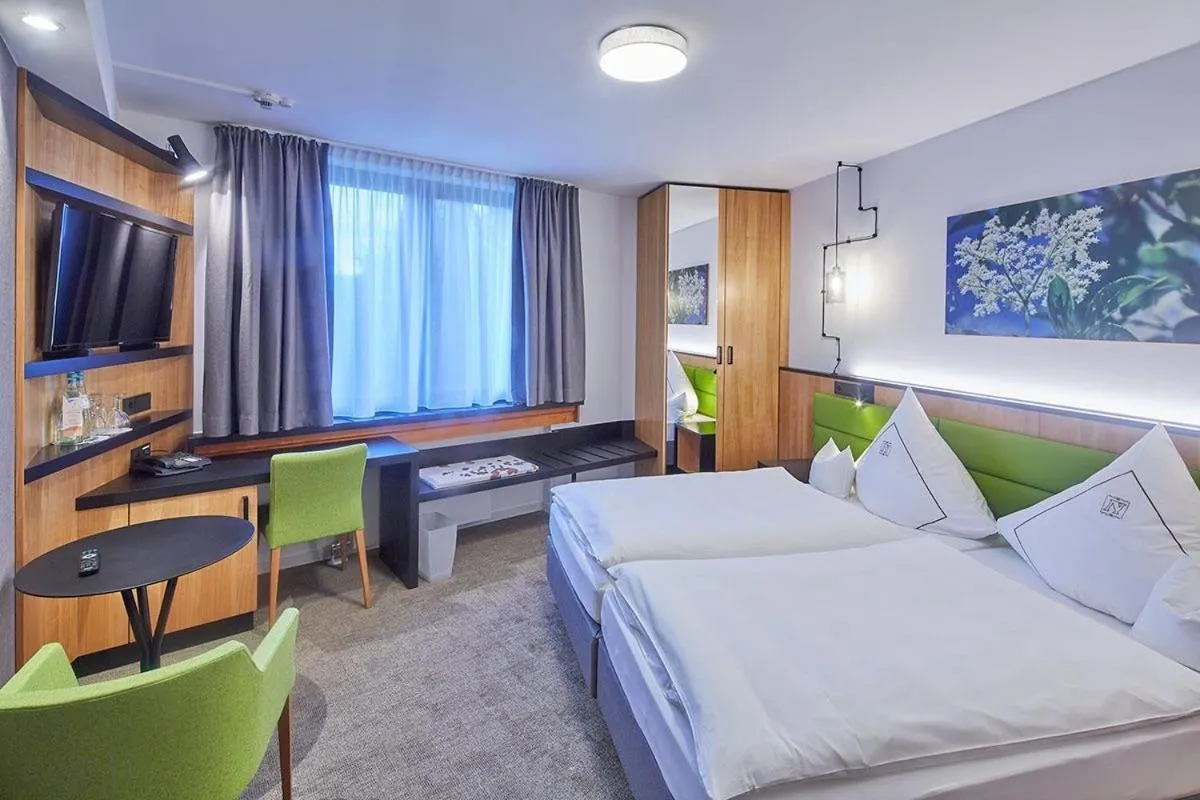 Photo of the whole room, Bed in Landhotel Naafs-Häuschen