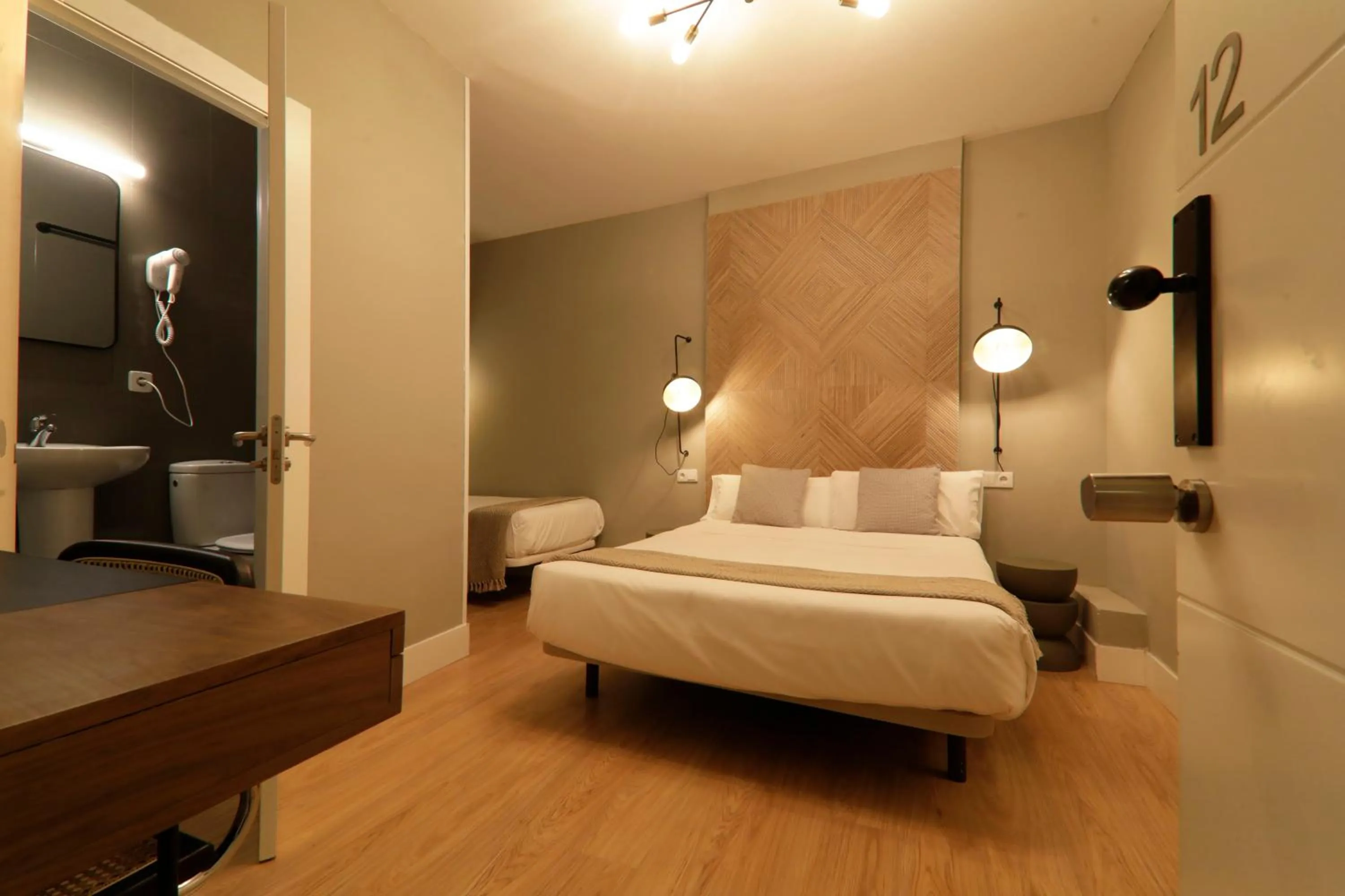 Bed in SUITES YOU Gran Vía