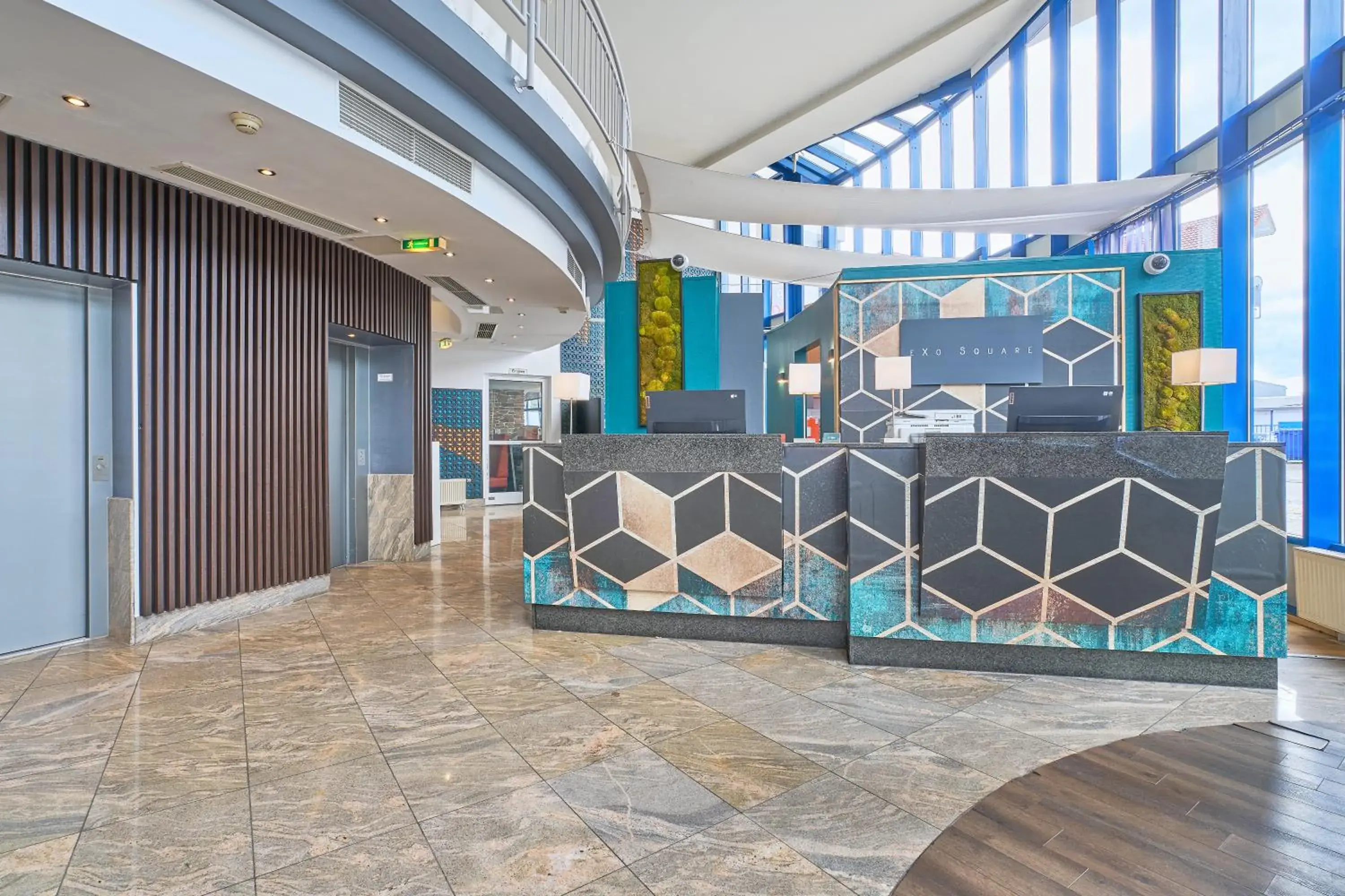 Lobby or reception in eXo Square Heidelberg/Schwetzingen - by SuperFly Hotels Lobby or reception in eXo Square Heidelberg/Schwetzingen - by SuperFly Hotels