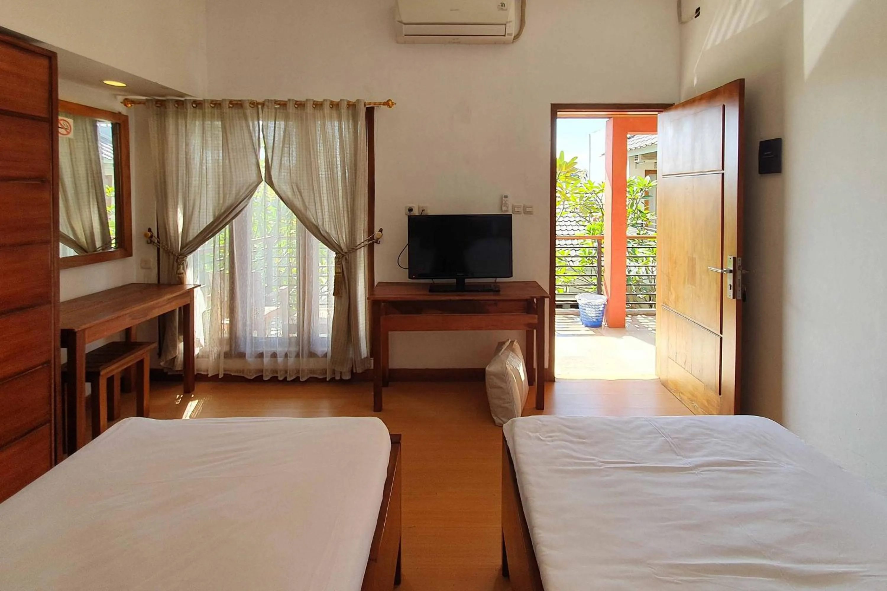 Bed in Rumah Eyang Tardjo Syariah Mitra RedDoorz