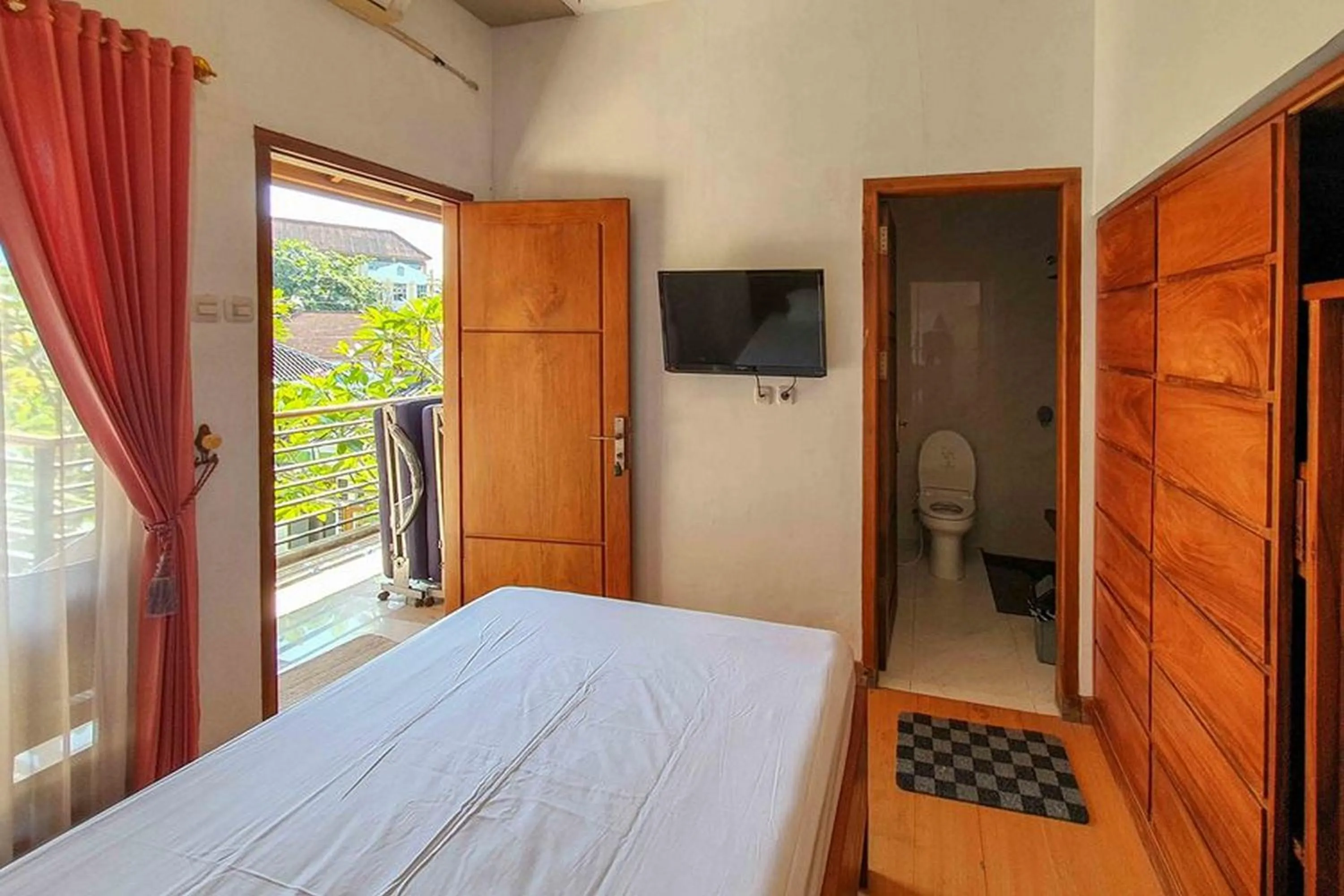 Bed in Rumah Eyang Tardjo Syariah Mitra RedDoorz